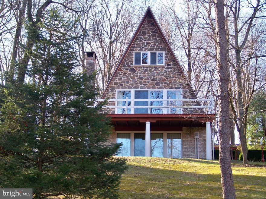 THIS PROPERTY TO BE OFFERED AT PUBLIC AUCTION ON APRIL 20, 2024 BY LEFEVER & HART AUCTIONS LLC. LISTED PRICE DOES NOT INDICATE SALE PRICE, THAT WILL BE DETERMINED BY HIGHEST BID AND ACCEPTANCE BY SELLER. 
Nice Well- Maintained House And Property In Penn Manor School District On 1.1 Acres Lightly Wooded Lot. This A-Frame Home Offers Ground Level Family Room w/ Wood Burning Fireplace, Laundry, Full Bath & One-Car Garage. Main Level Hosts Living Room w/ Sliding Doors To Deck, Kitchen & Dining Area, Bedroom & Full Tub Bath. Upper Level Features Two Bedrooms & Large Closet. Detached 20' x 25' Garage W Heat & Electric And Full Upper Floor Barn/ Workshop w/ Electric. Rear Yard Storage Shed. Very Nice Setting!!