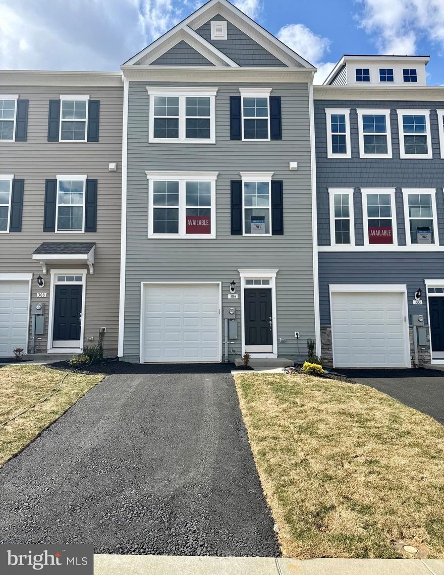 IMMEDIATE DELIVERY***OFFERING UP TO 15K INCENTIVE  FOR PRIMARY RESIDENCE WITH USE OF PREFERRED LENDER AND TITLE.  CONTACT SALESPERSON/CONSULTANT FOR DETAILS*** 
MOVE-IN READY!  Come home to Berkeley County’s premier planned community featuring a clubhouse, swimming pools, walking trails, lush landscaping and mountain views. The Darlington II with stunning elevation 3, 3 level townhome with 1 car garage. This home features 3 Bedrooms and 3.5 Baths. The front porch leads directly through the front door into the spacious lower level including 9 ft. ceilings, foyer with a double coat closet, and access to the garage. Continuing into the fully finished lower level complete with a recreation room, full bath, and walkout access to rear yard with privacy fencing. This home features a 3 level morning room extension and oak staircases throughout. Open concept main level with 9 ft. ceilings, luxury vinyl plank flooring throughout this level, dining room and kitchen with stainless appliances. The kitchen has a large 8’ plus island, upgraded level 2 kitchen cabinets, and quartz countertops. This leads directly into living room with powder room. The primary suite includes a tray ceiling and large walk-in closet. The primary bathroom includes a vanity, tiled shower and separate soaking tub. Laundry is located on the bedroom level.