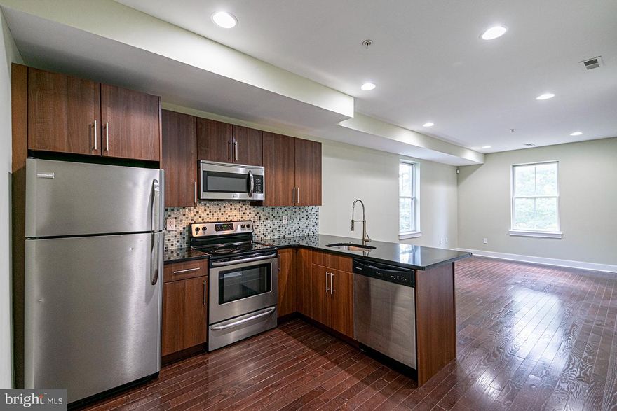 *Available 6/1!*

This huge bi-level 4 bedroom, 3 full bathroom corner apartment at Corinthian Court is not to be missed! Located in the rear of the complex that faces the shared courtyard, you'll be minutes from Fairmount Ave and all of its attractions including our very OCF Coffee House across from Eastern State Penitentiary. You will enjoy an open floor plan living room and kitchen that receives tons of natural sunlight, central air, washer/dryer, recessed lighting, and hardwood floors throughout. The kitchen features granite counter tops and breakfast bar, cool tone back splash tile, garbage disposal and stainless steel dishwasher, microwave, refrigerator and electric range. The bedrooms are spacious, bright and all include closets. The bathrooms feature modern tiles and floating vanity sinks. The first floor has two bedrooms and a bathroom in the hallway. The second floor has a bedroom, hallway bathroom and primary suite with an en-suite bathroom.

Lease Terms: Generally, 1st month, and 1 month security deposit due at, or prior to, lease signing. Other terms may be required by Landlord such as last month's rent upfront. $65 application fee per applicant. Tenants are responsible for: electricity, gas (if applicable), cable/internet and $10/mo technology fee. Water is a flat monthly fee of $105. Additional fees or requirements may be applicable for units with Homeowners or Condo Associations. Landlord Requirements: Applicants to make 3x the monthly rent in verifiable gross income, credit history to be considered, no evictions within the past 5 years, and must have a verifiable rental history with on-time rental payments. Exceptions to this criteria may exist under the law and will be considered. Cosigners will be considered.

*Small Dogs (35 lbs and under) + Cats – $350 non-refundable + $35/mo pet fee
*Photos of a similar unit in the building