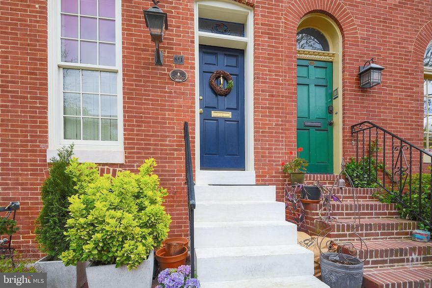 In the heart of the Historic district of Federal Hill, 811 William St is a spectacular 2100 sq ft home that was built in 1857. Just a half a block from historic Federal Hill Park on the highly desirable 800 block of William Street, this beautifully renovated home contains 4 bedrooms, 2.5 bathrooms and boasts modern updates while preserving its beautiful historic charm.On the first floor, you will find an open floor plan with 2 fireplaces, crown molding and hardwood floors throughout. This home boasts a gourmet kitchen with stainless steel appliances, granite counter tops and large windows allowing in an abundance of natural light. A second family room off the kitchen offers a warm inviting space with a wood burning fireplace, skylights, first floor laundry and powder room.On the 2nd floor, you will be greeted by a Master Suite with a 3rd fireplace, hardwoods throughout and a gorgeous renovated master bathroom with heated floors, a large shower and a custom walk in closet.You will continue to notice the historic charm on the 3rd floor with original hardwoods, 2 additional bedrooms and a full bathroom that includes a claw foot tub with updated finishes. Moving out to the 2 Tier Deck which features sweeping views of the Inner Harbor, historic Federal Hill Park and the surrounding neighborhoods.This beautiful tree lined block of Federal Hill offers many amenities including a spectacular 4th of July celebration and welcoming neighbors. Inner Harbor attractions and many shops and restaurants are just steps away. A truly special place to live!PLEASE FIND THE VIRTUAL FLOOR PLAN TOUR AND GUIDED VIDEO TOUR IN THE VIRTUAL TOUR SECTION OF THIS LISTING.