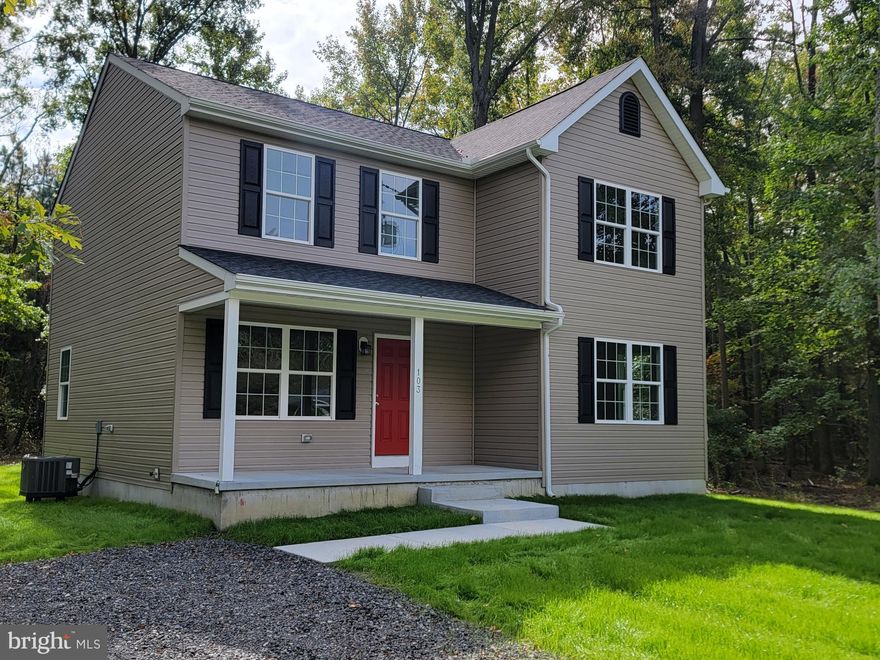 Nestled  on over one full  wooded acre on a small, quiet, dead-end street, this brand-new 3-bedroom, 2.5-bathroom home offers a tranquil escape in a parklike wooded setting.   The beloved  Cross Island Trail is a stone's throw away.   You will love the floorplan with an open-concept design, a gourmet kitchen with granite tops, high quality LVP plank flooring throughout the first floor, and both a living room and a family room.  It's ideal for both entertainment and daily living. Retreat to the private master suite with its own en-suite bathroom and expansive closet space. You are sure to appreciate the convenience of an upstairs laundry room. 

What makes this property truly exceptional is its expansive acre plus  gorgeously wooded lot, dramatically  larger than typical lots in the area offering room for whatever expansion your future might hold. This unique setting is further enhanced by backing to a 15-acre wooded parcel, offering incredible privacy and making it a haven for nature enthusiasts.  In summary, this home offers a generously-sized lot, an idyllic natural setting, and close access to outdoor adventures – an extraordinary opportunity not to be missed.