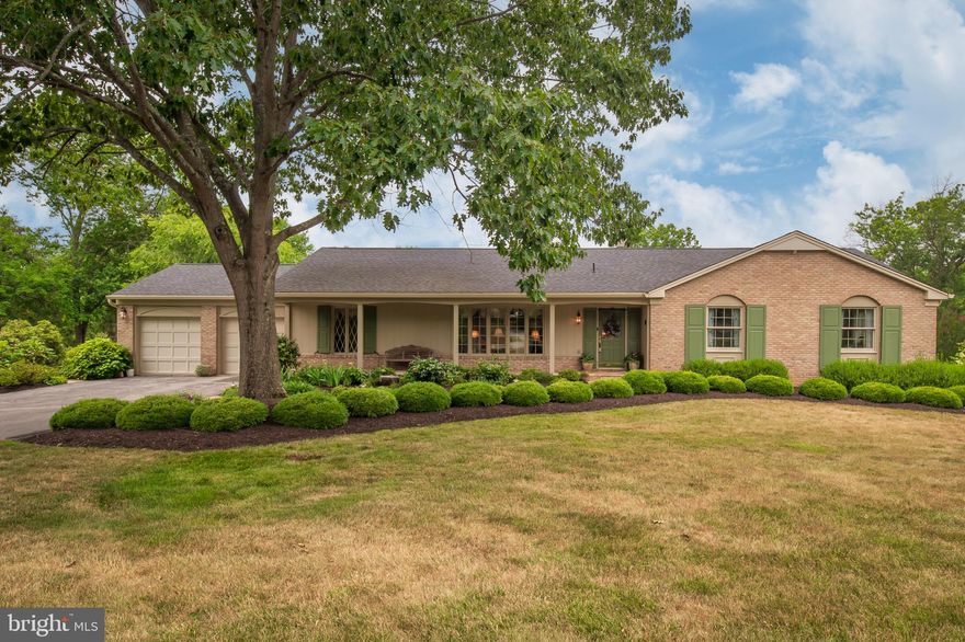 This charming Dunloggin rancher with 2 car garage is situated on an exceptional lot & exudes curb appeal with stone walkways, a rocking chair front porch & eye catching landscaping. Prepare to be thoroughly impressed inside & outside of this exquisitely maintained & updated brick home with: gorgeous hardwood flooring; generously sized formal living & dining rooms; on trend, renovated eat in kitchen with Quartz counters & stainless steel appliances opening to a sun filled family room with gas fireplace flanked by custom built-in bookcases; convenient main level laundry & powder rooms;  three main level bedrooms & two striking remodeled baths. The expansive walkout basement has multiple windows, a new sliding glass door opening to a stone patio overlooking the peaceful rear yard, 4th bedroom, 1/2 bath, & lots of potential for recreation / hobby space / workshop / home gym. Enjoy this central Ellicott City location, exceptional schools,  plus nearby parks & amenities - welcome to your new home!
Roof approx 9 years old; air conditioning replaced 3/2016; water heater replaced 9/2013.