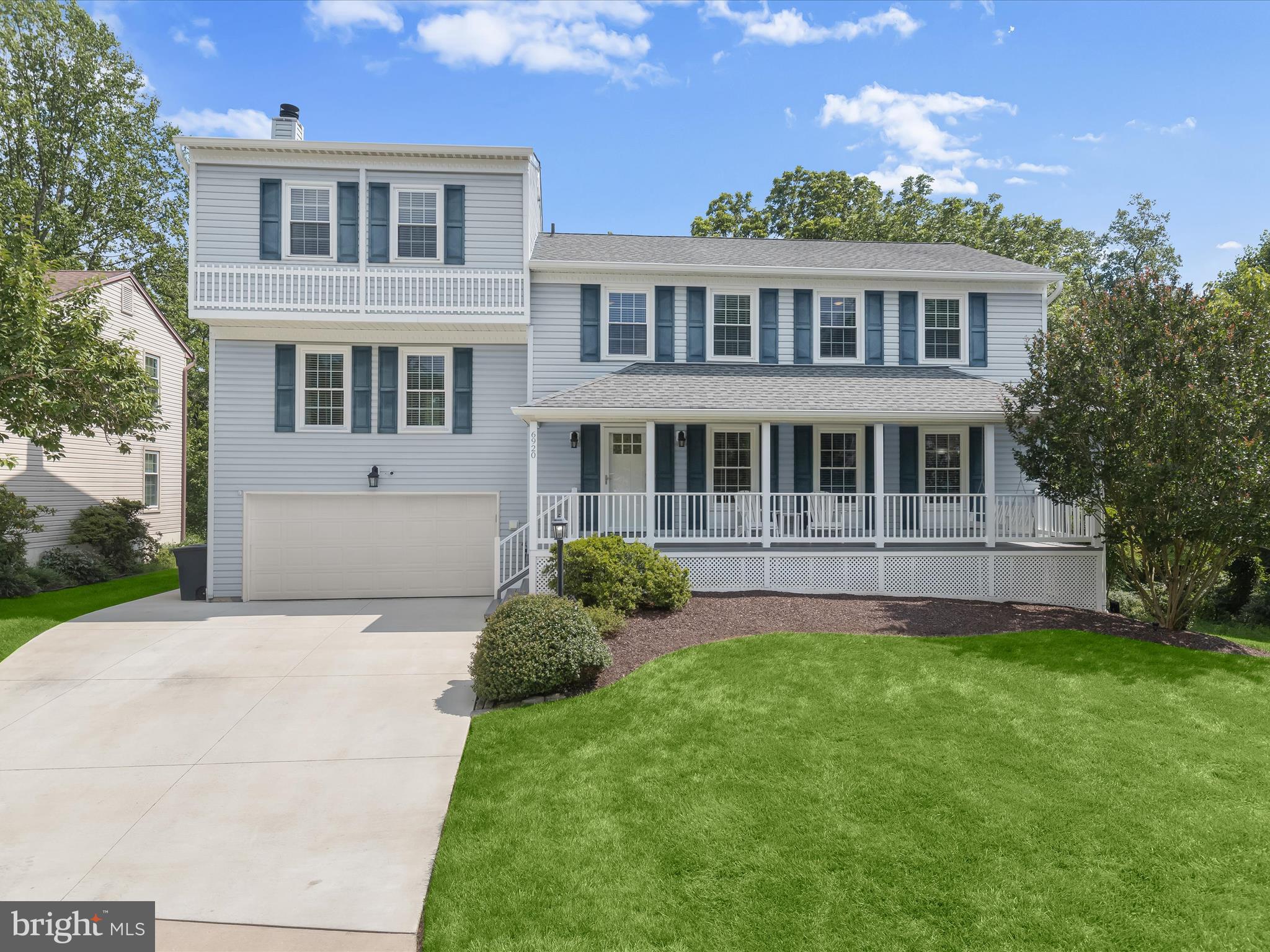 Stunning, exquisitely upgraded 5-bedroom, 3.5-bath colonial home tucked away on a quiet cul-de-sac on a premium lot backing to woods in Columbia’s coveted Village of Kings Contrivance. Offering over 3,000 square feet of refined living space, this exceptional home seamlessly blends timeless elegance with modern designer finishes throughout. Arrive via a charming covered front porch and step inside to rich hardwood flooring that graces the main level. The inviting living room is highlighted by a striking rustic wood accent wall and elegant crown molding. The open-concept layout includes the well-appointed gourmet kitchen, featuring a large island breakfast bar with a built-in drink cooler, granite countertops, a subway tile backsplash, stainless steel appliances including wall ovens, and an adjoining dining and sitting area perfect for entertaining. Sliding doors from this space lead to a generous screened porch with skylights and an attached open deck offering beautiful, tree-lined views. A stylish powder room and a convenient laundry room complete this level. Ascend the stairs off of the kitchen and discover the spacious family room anchored by a classic wood-burning fireplace, offering the ideal retreat for relaxed gatherings. Four generously sized bedrooms, including one with its own private bath and walk-in closet, plus a well-appointed hall bathroom are located on upper level one and continue to the top level to your own secluded primary suite oasis, featuring a luxurious, newly remodeled spa bath with a centerpiece soaking tub framed by exquisite marble tile, dual granite vanities, and an expansive frameless glass shower with dual shower heads for a truly indulgent experience. The finished lower level is designed for versatility and enjoyment, offering walk-out access to the backyard, a dramatic rustic accent wall, and clever hanging doors that create a fully darkened, theater-style space, perfect for movie nights. A large utility and storage room ensures abundant space for organization. Additional upgrades include beautifully renovated bathrooms, a Trex front porch, new attic insulation, new carpeting, two water heaters, and so much more. This exceptional property is ideally located just a few hundred meters from the community swimming pool, tennis courts, and Columbia’s extensive network of scenic hiking paths. Enjoy the best of vibrant Columbia living, with its endless shopping, dining, and entertainment options plus easy access to major commuter routes. This is truly a rare opportunity to own an impeccably updated home in one of Columbia’s most sought-after neighborhoods.