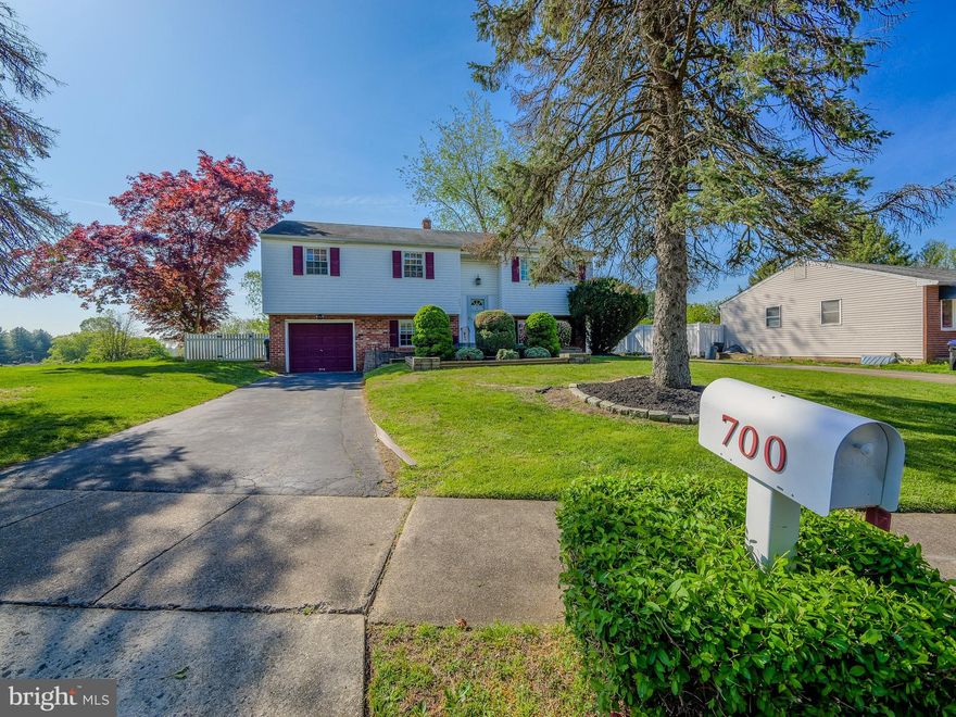 Welcome to 700 Cotton Lane. This charming 4 bedroom bi-level has so much to offer. Featuring four large bedrooms, updated full bath and half baths, and a fresh coat of paint in the main living areas. The kitchen has been opened and a counter installed for additional seating. The lower level showcases a stone fireplace and large bar, perfect for holidays and football Sundays! Step outside into your back yard oasis where you will find an above ground pool with a deck large enough for lounging. Additionally, you'll find a paver patio with a hot tub and large fenced in yard with a gorgeous view! Call to schedule your tour today! Professional photos coming soon!