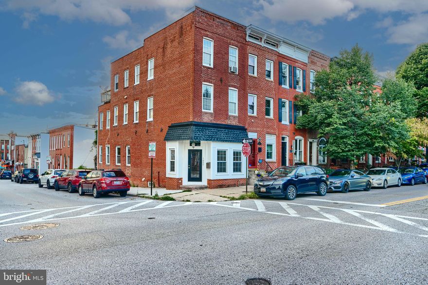 Nestled in the heart of Baltimore’s charming South Baltimore neighborhood, 1650 S Charles Street is a beautifully updated rowhome that effortlessly combines historic character with modern luxury with 2-Car PARKING! This light-filled rental offers four spacious bedrooms and three contemporary full bathrooms, featuring gleaming hardwood floors and newer carpet throughout and an open-concept living space perfect for entertaining or cozy nights in. The chef-inspired kitchen is outfitted with stainless steel appliances, stone countertops, and generous cabinet storage. Residents will appreciate the convenience of in-unit laundry, central HVAC, and a private rear PARKING PAD—perfect for 2-3 cars. Just steps away from Cross Street Market, boutique shops, award-winning restaurants, and major commuter routes, this property offers the ideal blend of urban convenience and peaceful neighborhood living!