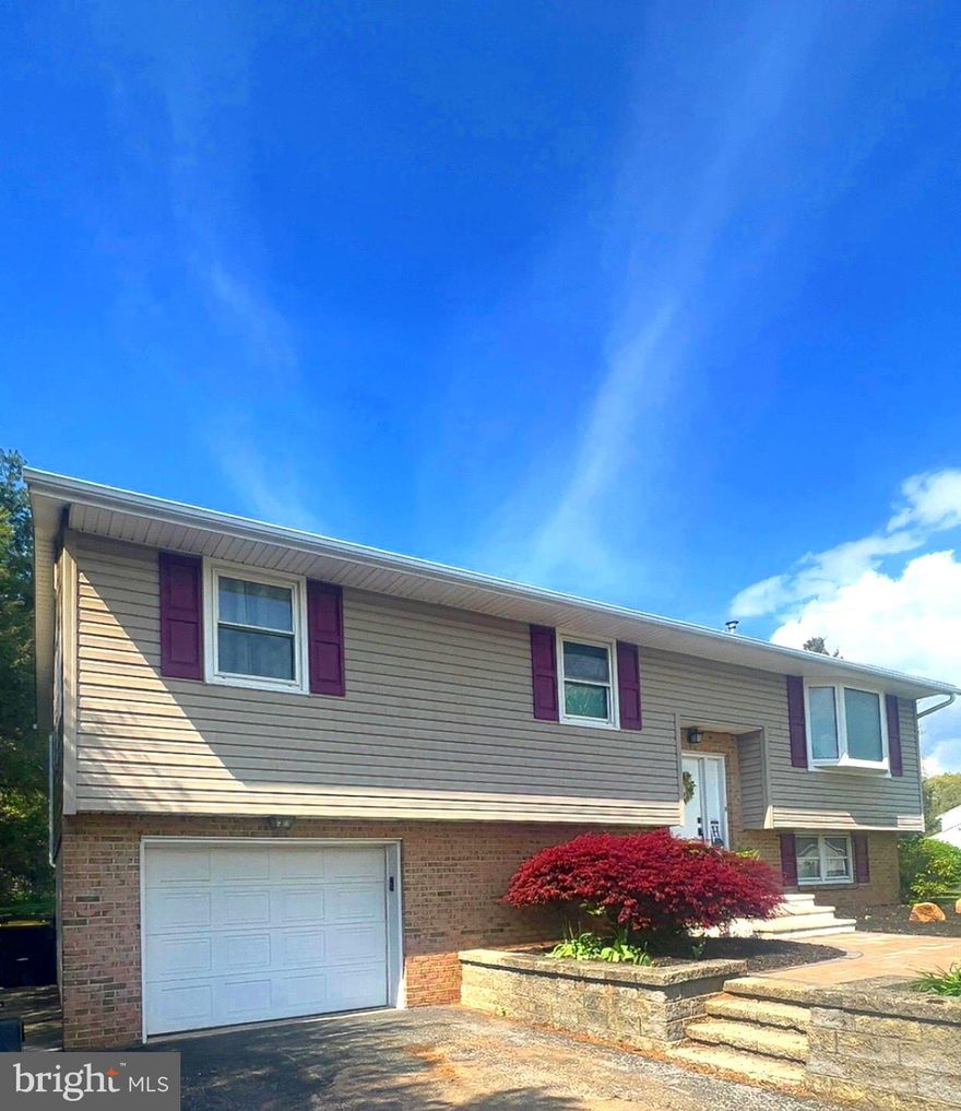 Welcome home to a meticulously maintained and updated bi-level home,  which offers a unique blend of functionality and charm. You can expect an updated kitchen, modern fixtures,  Corian countertop,  new flooring, CA, roof, and radon mitigation.  The upper level  features an open floor plan, allowing for ample natural light and a sense of spaciousness. Windows and skylights adorn the amazing addition which is not typical of a bi-level but adds a peaceful retreat where you may admire your large back yard in all the seasons of the year! Easy access to your outdoor pergola for an additional space to entertain!  The primary bedroom has the option for an half bath as  plumbing is in place.  Improvements ... Roof 2020, Longs Eco Water System/UV Light 2020, Radon Mitigation System 2020, CA/CH electric heat pump 2023, and Luxury Vinyl plank flooring through out the home.  Two additional heat sources, Efel Oil(Kerosene) stove in lower level family room; supplemental random electric baseboard.  A finished basement offers an exercise space, laundry room, family room or additional bedroom or as an office, full bath and a large storage room.  This layout maximizes space and offers a sense of separation between different living areas. The home's meticulous upkeep ensures a move-in ready condition, showcasing attention to detail in both the interior and exterior.   Step inside to your new beginning!