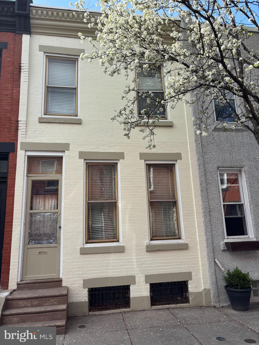 Fantastic opportunity to make this 2-story, 3 bedroom home your own!  Nestled on a picture perfect block in the heart of the Art Museum Area, this home offers endless possibilities. Located within close walking distance to all of the wonderful attractions, restaurants & cafes of the Art Museum Area. Being sold is its AS-IS condition.