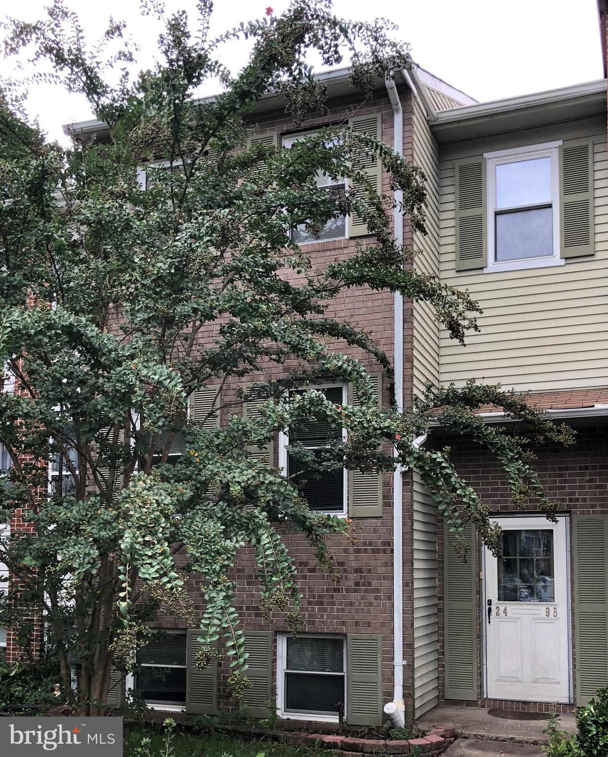SPACIOUS TOWNHOUSE - FRESHLY PAINTED - ALL NEW FLOORING - DINING ROOM - FOUR BEDROOMS - THREE FULL BATHS - CLOSE TO SHOPPING - LARGE DECK - WALKOUT BASEMENT - BEDROOM AND FULL BATH IN LOWER LEVEL - AVAILABLE IMMEDIATELY -