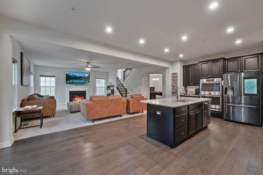 Those of you who know this area already know that living in Waldorf, Md offers a suburban atmosphere with easy access to Washington, DC. Waldorf has a variety of shopping centers, dining options, schools and parks for outdoor activities. Now let me introduce one of the most premiere active homes: 12261 Revolution Court, Waldorf, Maryland 20602. Welcome to this stunning, 5-bedroom,3.5-bathroom single-family home. This beautiful, upgraded home has it all with a boasting spacious layout with a dedicated HomeOffice and state-of –the-art theatre room. Perfect for movie nights or entertainment. Enjoying this gourmet kitchen is a chef’s dream, featuring top-of-the line appliances, sleek countertops, and a massive island that serves as the heart of the home. With ample room for meal prep, casual dining, and entertaining, the island is perfect for gathering with family and friends. The kitchen’s modern design is complemented by high-end finishes, custom cabinetry, and spacious layout that makes cooking a truly enjoyable experience. Whether you’re preparing a family meal or hosting a dinner party, this kitchen is built for both function and style. The expansive primary suite offers ample closet space, while additional bedrooms provide plenty of room for family and guests. With a private home gym, large deck, and patio, this home offers the ultimate indoor and outdoor living experience designed for creating lasting memories.