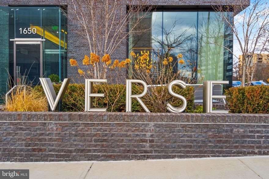 Ready for immediate move-in. Discover your refined sanctuary in this sophisticated 2-bedroom, 2.5-bath residence with two parking spaces at Verse—a luxurious condominium nestled in The Boro, Tysons' vibrant new neighborhood. Verse offers more than just a home; it presents a lifestyle crafted to elevate every moment. With interiors by the renowned Cecconi Simone, each residence is a modern masterpiece, blending sleek design with inviting warmth, perfect for those with a discerning eye for quality and style.
Step into a world of exclusive amenities that cater to your every need. Picture yourself relaxing by the designer fireplace in the stylish lobby, arranging dinner reservations with our 24-hour concierge, or hosting friends around the chef’s kitchen in our celebration space. The outdoor terrace offers a serene escape, while the fully equipped fitness spa invites you to recharge at your convenience.
Built by award-winning architect Shalom Baranes, Verse stands 25 stories tall, housing 140 exquisitely designed residences with floor-to-ceiling windows for abundant natural light. This units feature private terrace, blending indoor luxury with fresh air and open skies.
Located in the heart of The Boro, Verse puts everything you need right at your doorstep. Ride the Metro Silver Line to explore the DC area, gather fresh ingredients at Whole Foods Market, or unwind with friends at Tysons’ newest luxury cinema. Verse redefines urban living with a blend of elegance and convenience in a community that is lively, stylish, and effortlessly connected. Verse: Where luxury meets lifestyle.