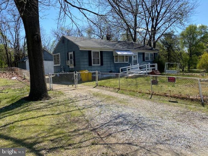 TWO BEDROOM RANCHER WITH BASEMENT AND A TWO CAR GARAGE EXISTS. FULLY FENCED YARD. LOTS OF POSSIBILITIES.ZONED W-1/  MAY BE USED FOR LIGHT INDUSTRIAL PURPOSES. PARKING, STORAGE, OFFICES, GARAGES, LIGHT MANUFACTURING. CLOSE TO -95, 695, 695, 895, 97, 295, AND BWI AIRPORT.