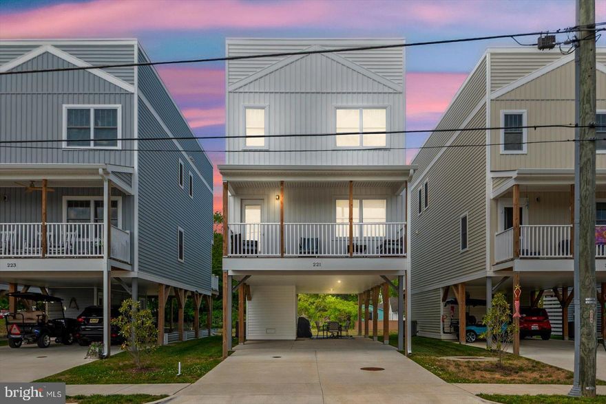 Where River Days & Easy Living Come Together

Life at School Hill Townes is all about slowing down, stepping outside, and actually enjoying where you live. Imagine starting your morning with coffee on your covered balcony, catching a glimpse of the Potomac River, and ending your day with a sunset walk to the boardwalk—just minutes from your front door.

This 3-bedroom, 2.5-bath home was designed for the way you want to live. The open main level brings everyone together, whether it’s a quiet night in or a house full of friends. The kitchen, dining, and living spaces flow seamlessly, creating a light, easy atmosphere that feels both modern and comfortable.

Throughout the home, coastal-inspired finishes and soft, beachy tones reflect the surrounding lifestyle—relaxed, welcoming, and effortlessly stylish.

Downstairs, covered parking for up to three vehicles gives you the flexibility you didn’t know you needed—room for cars, golf carts, beach gear, and everything that comes with river life.

And then there’s the location…
Step outside and you’re moments from everything that makes Colonial Beach special—morning coffee runs, waterfront dinners, live music, boutique shopping, and spontaneous golf cart rides along the water.

Whether this becomes your full-time home or your weekend escape, one thing is certain—you won’t just live here… you’ll live differently here.