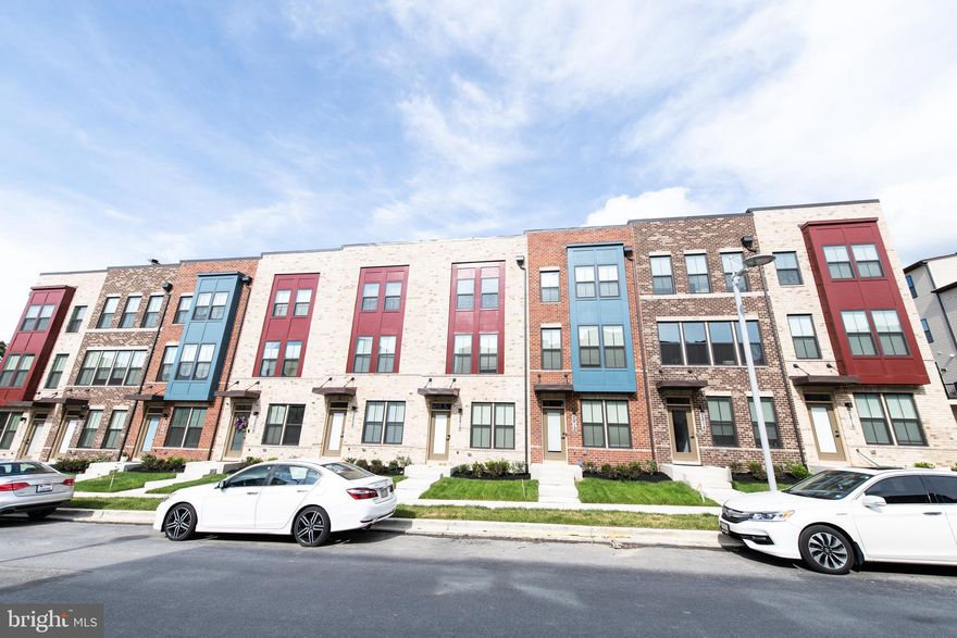 BRAND NEW URBAN LUXURY STYLE TOWNHOUSE! Here is an amazing chance to enjoy new construction and the proximity this community offers to living and simple pleasures! This property is steps to Metro, minutes to DC, restaurants and shopping. This 3 bedrooms, 3.5 bath home offer space big enough for any dynamic that is seeking the above amenities in a fresh vibrant community.  Additionally, internet service comes free with your time here, as an amenity. Also, the brand new washer and dryer features all of the modern accessories like steam and de-wrinkling options. The home has three levels, the entry hosts one room and access to the garage and a full bathroom. As you retreat to the main level, you’ll find the kitchen with stainless steel appliances, a large island and an amazing deck space for the most cohesive living experience. Control your garage via an app, as well as regulating your homes internal temperature with the Google nest integration. Finally, the top level hosts two bedrooms and both include en suites. To enhance life, the HOA covers cutting the grass, leaving you to only water it, to help maintain the beauty of this budding community. This home offers you the opportunity to experience a true permutation of urban and suburban living. The grounds of the community includes an outdoor gym and dog park.