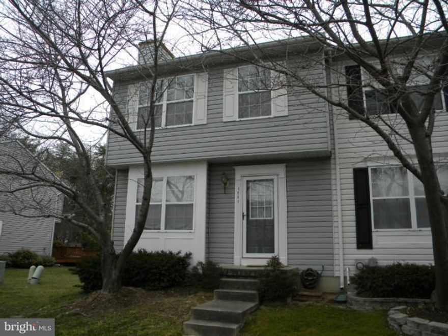 Lovely End Unit in move in condition.  Hardwood floors on the main level; Living Room with Cozy Fireplace.  Full Basement finished with Spacious Family Room and Full Bath. Custom Deck for great summer entertaining. .