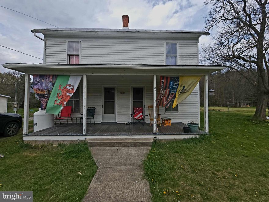 Charming circa 1920 farmhouse with 4 bedrooms, 1 bathroom, and original hardwood floors and walls. Situated on a mostly level cleared lot, offering serene views backing up to a picturesque creek. Sold 'as is', this property presents a fantastic fixer-upper opportunity with ample potential. Contact Brittany Bogan or your agent to schedule your showing today!