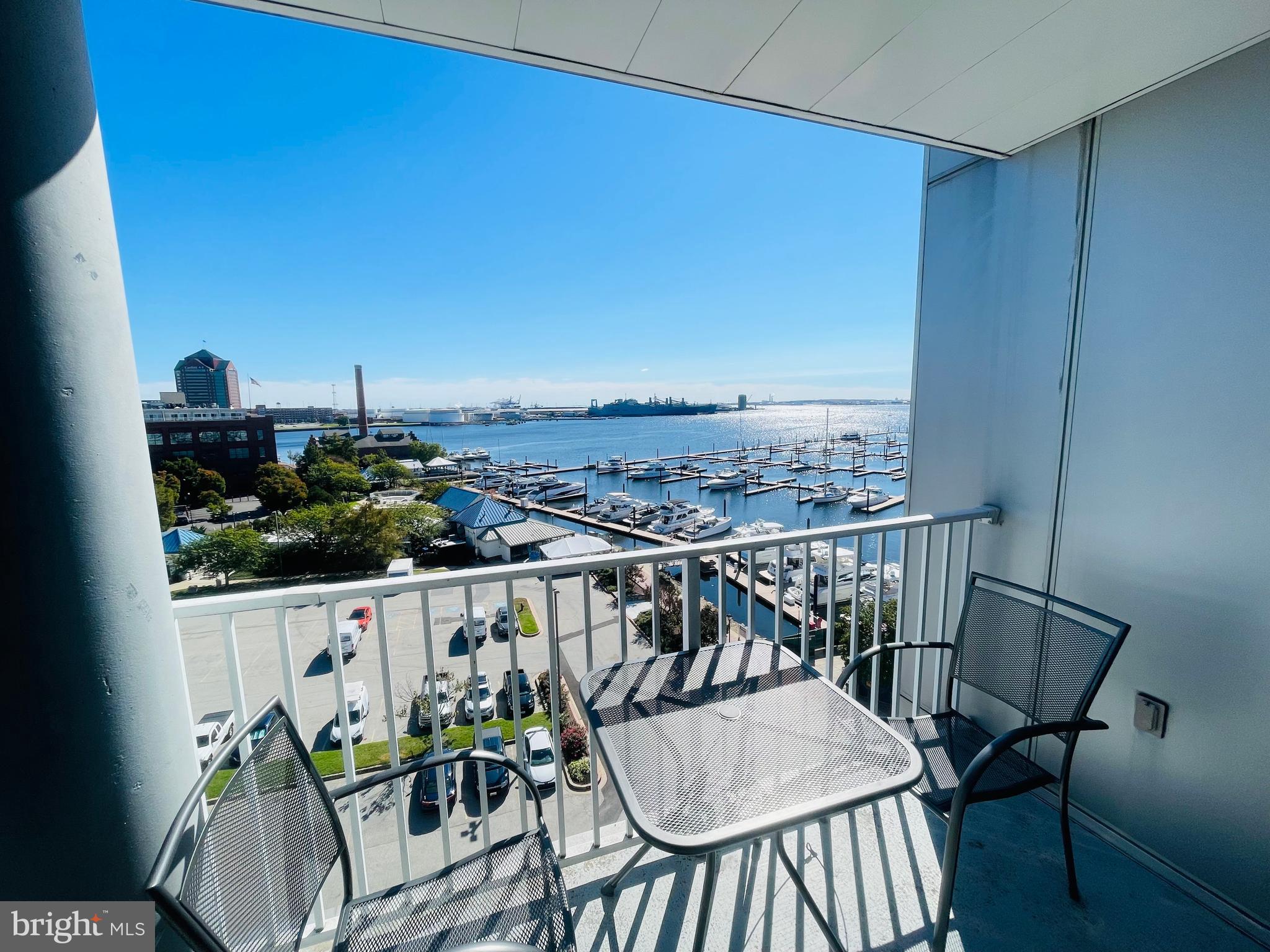 Two-bedroom, two-full-bath condo located on the upper floor of a 24-hour security building. This unit includes two spacious, deeded garage parking spaces. Recent updates feature new engineered wood floors (2022), new vanities and mirrored cabinets in both bathrooms (2022), custom interior paint (2021), and a new air-conditioning unit (2021).
Enjoy water views from every bedroom, the living room, and the kitchen. Step out onto the spacious balcony to sip your coffee or tea while taking in the beautiful sunrise, passing cruise ships, occasional fireworks from Fort McHenry, or simply watching the world go by along the promenade below.
The building is pet-friendly and features two on-site gyms. Several restaurants and bars are located on the first floor and nearby.
This condo has been gently lived in and well cared for. Come make it yours!