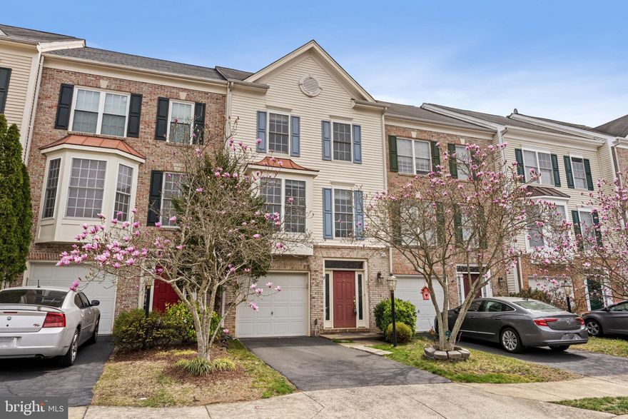 This beautiful, light-filled townhome offers a perfect blend of modern comfort and convenience. Featuring wide plank hardwood floors and updates throughout, the spacious living area seamlessly flows into an eat-in kitchen with a custom subway tile backsplash, pantry, and plenty of counter and cabinet space. The primary bedroom is a serene retreat with vaulted ceilings, a walk-in closet with a custom organizer, and an en-suite bathroom with a double sink vanity. Enjoy the large back deck that overlooks the fully fenced backyard and peaceful common area behind the home, ideal for outdoor relaxation or entertaining. Additional highlights include one car garage, one assigned parking spot, abundant guest parking, and a location just minutes from schools, restaurants, shopping, parks, and commuter routes. This home is the perfect choice for those seeking both style and practicality. This is the one!