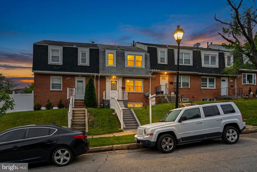 Ready to move into townhome that has numerous updates sure to please.  Convenient location with quick access to all travel sources.  Beautiful hardwood flooring, eat in kitchen, fenced in back yard and so much more.  Full basement features family room, additional room that could be used as a bedroom, laundry room and access to the back yard with patio and fenced in area.  A must see.