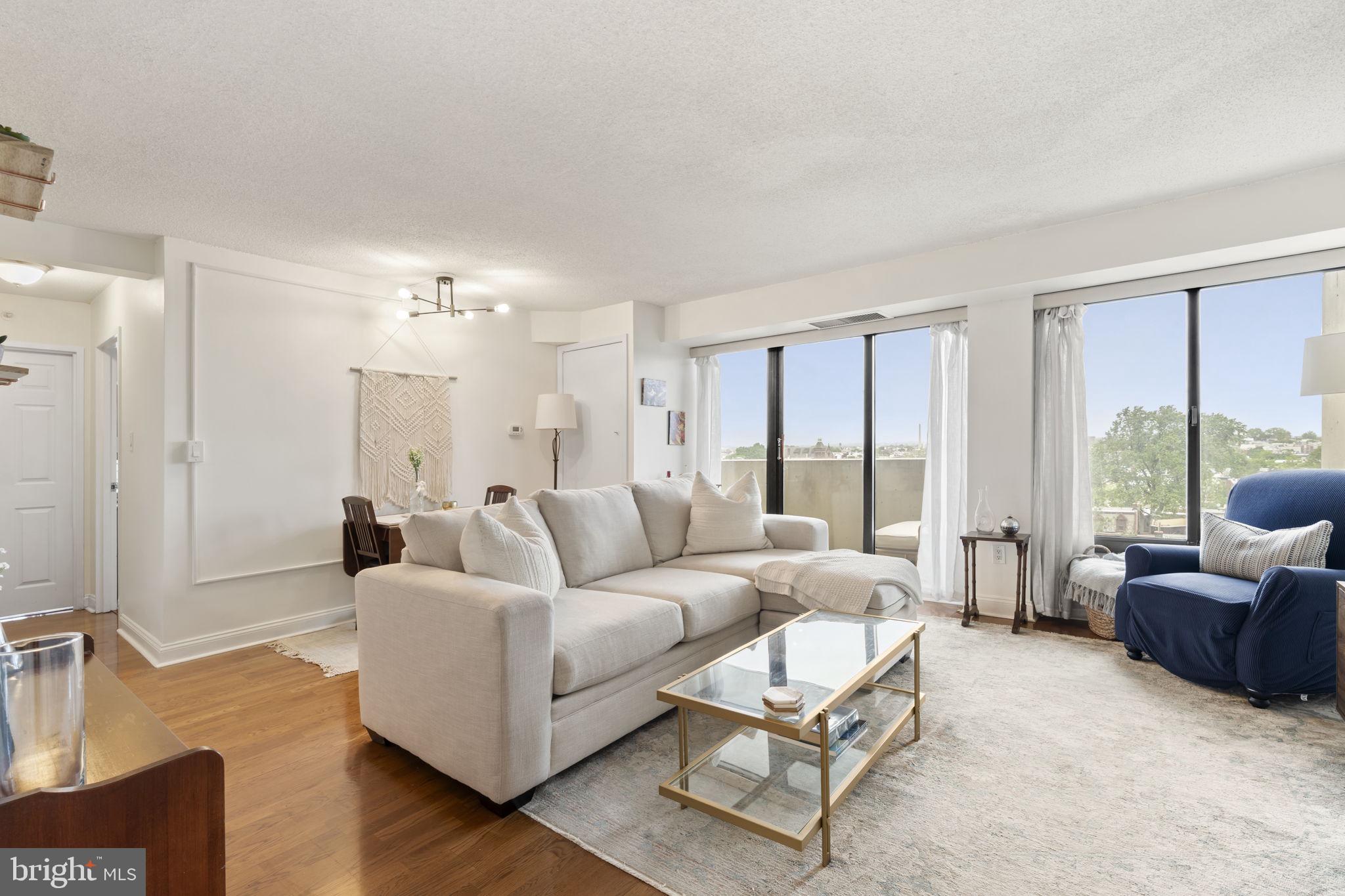 Welcome to unit 1029, a northwest corner unit at City View Condominiums with GARAGE parking. This sun-drenched two-bedroom, one-bathroom residence boasts an inviting private balcony and comes with the convenience of a dedicated covered parking spot. The well-appointed kitchen offers ample storage space, featuring an electric range, dishwasher, built-in microwave, and extra cabinetry, all seamlessly connected to the living and dining areas through a charming pass-through window. Gleaming hardwood floors enhance the living space, leading effortlessly to the balcony via a sliding glass door. Enjoy the spacious primary bedroom and a second bedroom with a generous closet. The centrally located bathroom is complete with a storage vanity and a tub shower.
City View Condominiums provides exceptional amenities, including a heated pool with a serene garden, bike room, fitness center, on-site laundry, and 24-hour security. Guests can enjoy the convenience of an on-site guest suite. Ideally located near Whole Foods, Target, museums, restaurants, and numerous attractions, the building ensures easy access to Center City via SEPTA bus or a leisurely walk to Rittenhouse Square. Embrace an active lifestyle by utilizing the fitness center or enjoying the nearby scenic paths of Kelly Drive for walking, biking, and running.