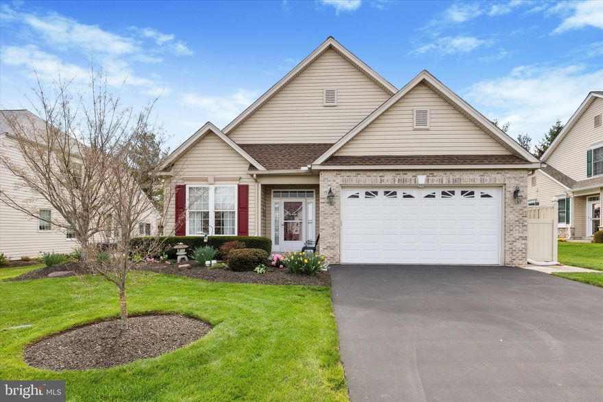 Welcome to easy living in the desirable 55+ Kingsfield community in Franconia Township! This lovingly maintained and thoughtfully improved 2-bedroom, 2-bath carriage-style ranch home offers the perfect blend of comfort and convenience. Enjoy the ease of one-floor living with a 2-car garage and driveway parking. Step into the bright and inviting open foyer, where formal living and dining areas feature hardwood floors and an abundance of natural light. French doors open to a versatile office space—ideal for working from home or relaxing with a good book. The updated eat-in kitchen has been tastefully updated, showcasing newer appliances, tile backsplash, a center island, pantry, and storage nook, all complemented by neutral decor. The two-story family room is the heart of the home, featuring a ceiling fan, cozy gas fireplace, and sliders that lead to a private back patio complete with an awning—perfect for relaxing or entertaining outdoors. The spacious primary suite is tucked away off the family room and offers generous closet space, including a large walk-in, and a stunningly renovated bathroom with a tiled walk-in shower, glass door, double vanity, and designer finishes. A second well-sized bedroom, full hall bath, and convenient laundry area complete the layout. The low-maintenance lifestyle includes lawn care, snow removal, and trash service, while the community offers sidewalks, a walking path, and a friendly neighborhood atmosphere. This home also features a newer roof and replacement windows. Don’t miss your chance to enjoy comfort, style, and simplicity in Kingsfield—schedule your tour today!