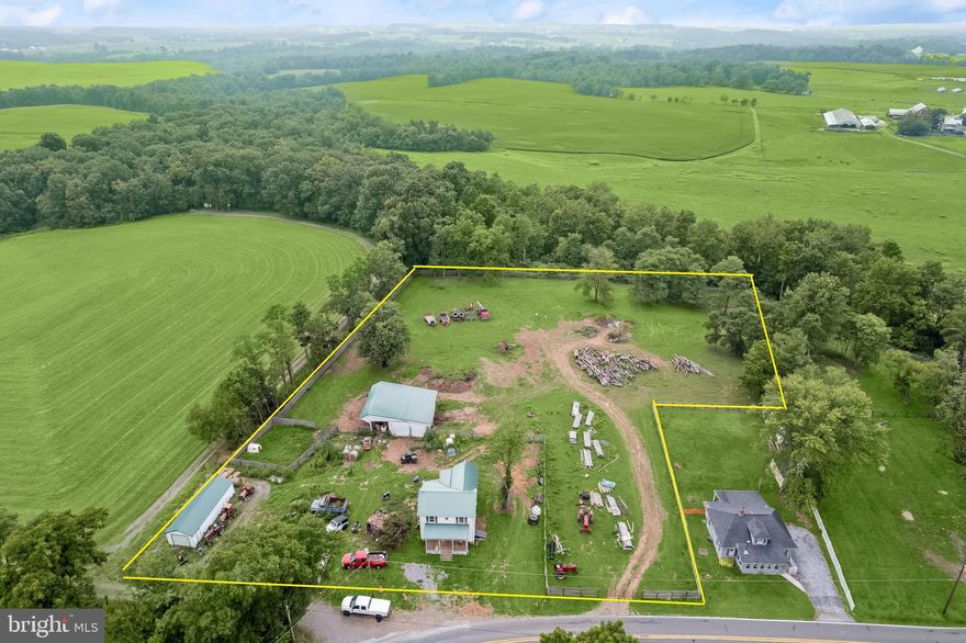 Charming Farmhouse built in 1880 on 3 Scenic Acres.  Nestled in the heart of picturesque countryside, this 3-bedroom, 1-bath farmhouse offers peaceful rural living with endless potential. Surrounded by brand-new fencing, the property is ideal for horses, hobby farming, or simply enjoying open space and sweeping views.  Inside, the home features a spacious living room, a large eat-in kitchen, and an adjoining mudroom with laundry that leads to the backyard. The main level also includes the original sitting room, versatile as a fourth bedroom, home office, or playroom. Upstairs, you’ll find three bedrooms with original hardwood flooring, a full bath, and a generous walk-in storage room plus attic access for even more storage. The lower level provides additional space to customize or use for storage.  With solid structure, scenic surroundings, and plenty of room to grow, this is a rare opportunity to own a slice of the countryside.