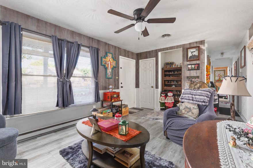 Nestled in the charming Sylvan Grove neighborhood, this delightful ranch-style home offers a perfect blend of comfort and functionality. Built in 1991, this well-maintained residence boasts 1,303 square feet of inviting living space, featuring three cozy bedrooms and a full bathroom designed for relaxation. Step inside to discover a traditional floor plan that seamlessly connects the kitchen and dining areas, ideal for both everyday living and entertaining. The country-style kitchen is equipped with essential appliances, including a built-in microwave, electric oven/range, refrigerator, and a convenient icemaker, making meal prep a breeze. Enjoy the warmth of the living room, highlighted by a charming fireplace, perfect for cozy evenings. The home features beautiful wood / laminate floors and plush carpeting, creating a warm and inviting atmosphere throughout. A ceiling fan adds comfort, while the entry-level bedroom provides easy accessibility. The main floor laundry adds to the convenience of daily life. Outside, the spacious 0.31-acre lot offers ample room for outdoor activities, complemented by a shed for additional storage. The community benefits from road maintenance, ensuring a well-kept environment. Located near local amenities, including parks, I81, Rt51, schools,  shopping, and dining options, this home is a true gem in Sylvan Grove. Experience the warmth and comfort of this inviting residence, where every detail has been thoughtfully considered for your enjoyment. Roof was replaced with Arch Shingles in 2017,  the heat pump was replaced in 2023, the water heater in 2020.