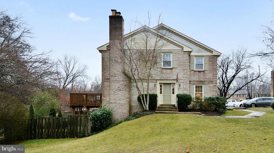 Rarely available end unit backing to woods in quaint neighborhood. Great community feel with neighborhood pool, tot lot and public creek access. Open floorplan has hardwoods on the main level, large living room, spacious dining room and kitchen/family room/breakfast room combo. 4 bedrooms 2 baths up including a spacious master. Walk-out basement has recreation room, study and full bath. Hurry!