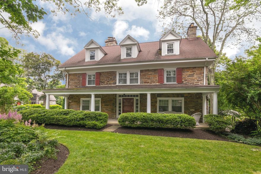 Surrounded by a lush perennial garden, this stone, corner Colonial built in 1907 is sheer elegance redefined.  Usher past the colorful hydrangeas to the covered front porch to discover multiple seating areas to welcome you and your guests to the homes serene setting, located on nearly a half acre lot.  Inside, the wide center hall connects the spacious Living Room and Formal Dining room, accented by original millwork and stained oak flooring while the gracious staircase and patterned runner ahead is washed with natural light from the elongated window positioned above.  The scale of the Living room creates the perfect environment to host large family gatherings or curl up for a romantic evening in front of the wood burning fireplace. Imagine large dinner parties served in the Dining room with its own fireplace, custom built-ins, French doors and expansive windows to reveal the enchanted greenery beyond.  A pass through into the Chef s Kitchen conceals a private Powder room for guests. With an abundance of richly toned custom cabinetry, built-in pantry, high end appliances and high polished Granite countertops, the eat in Kitchen is bound to summon your inner Chef.  The stone paved outdoor terrace off the Kitchen beckons one to dine al fresco under the stars while surrounded by mature trees, custom up lighting to illuminate the foliage and pathways and grounds meticulously planted by the homeowner and acclaimed Gardener, Jerry Fritz.  A living privacy screen surrounds most of the homes exterior creating a backdrop for the homes tranquil, outdoor oasis. Meander down the path to the permeable paver driveway and 2 car oversized garage with a loft space above. Back inside, ascend up the secondary staircase to the private living quarters where the Master Suite resides and offers a luxurious Master Bath with dual pedestal sinks, wainscoting, emerald green Granite floors & shower walls, heated floor and a glass enclosed shower with bench seating.  Adjacent to the bedroom, a custom dressing room is outfitted with a three-way mirror, built in drawers, shelving and bench seating.  Adjoining the dressing room, a second bedroom awaits; ideal as a nursery, library or home office with built in bookshelves and cabinetry installed.  Down the hall, two large Bedrooms share a renovated Guest Bath featuring an extra deep soaking tub, glass enclosed shower, granite surround and tailored vanity.  The third floor reveals two additional bedrooms, an open Den, a Cedar lined storage room and another full private Bath with a shower and glass top vanity.  As if there wasn t enough space, the Basement is portioned into three separate areas; a relaxing lounge for watching movies, a workroom/storage area and a playroom plus a Powder room.  Other noteworthy features include an abundance of closet space throughout, Inground sprinkler system set on a timer, 2 zone HVAC, Nest Thermostats, and a French Drain Basement System. This distinctive residence is located in the highly desirable Lower Merion school district and 1 block from Cynwyd Elementary School and Bala Cynwyd Middle School.  Minutes from the Cynwyd Train Station, Cynwyd Park, shops, dining and local amenities that both Bala Cynwyd and Narberth have to offer. Easy commute to Center City!