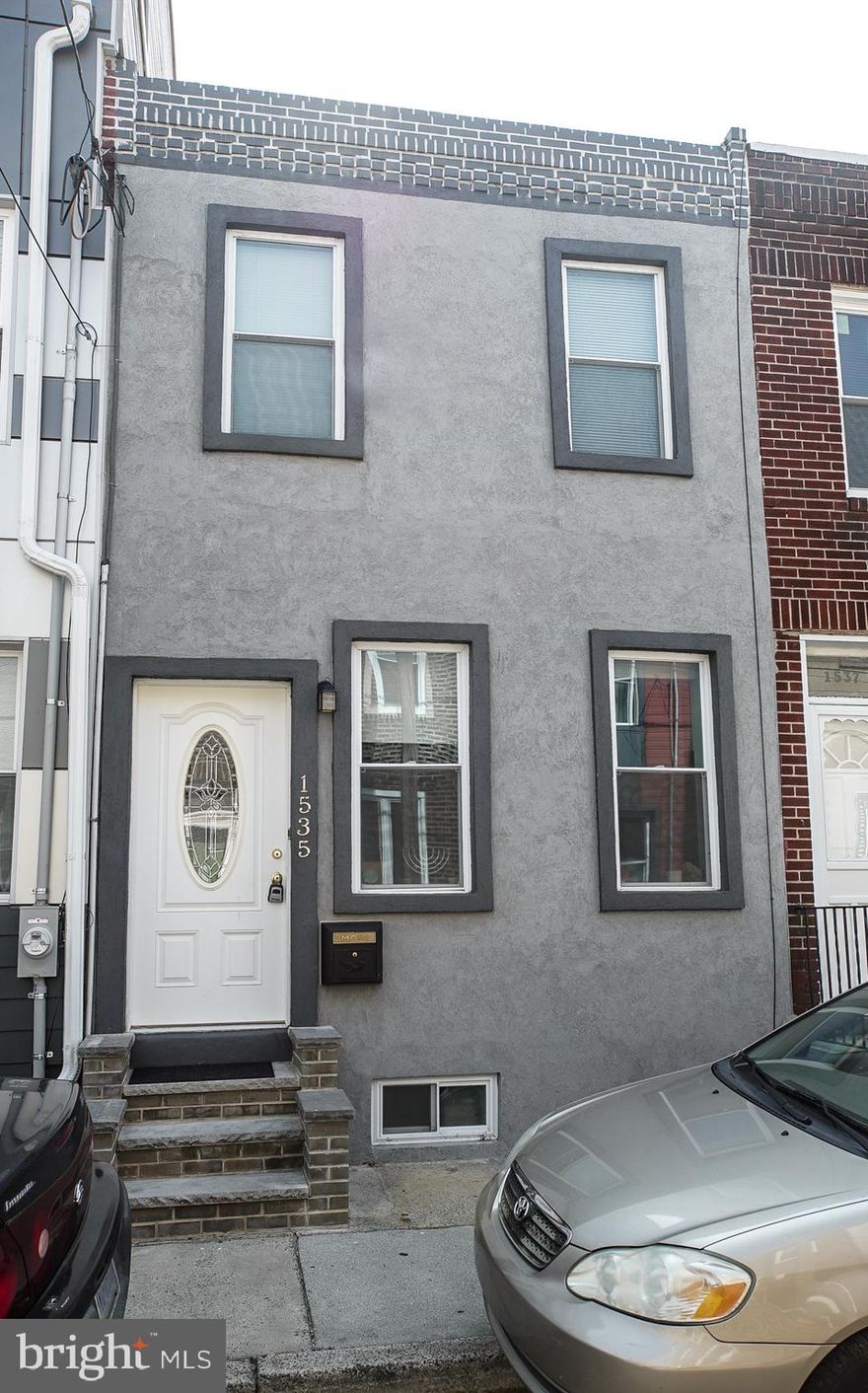 This is a MUST see home! Awesome rehab in New Bold ready for its new owner!  This 3 bedroom, 1.5 bathroom well-maintained home has many customized features and high end finishes throughout. Enter into a Living Room / Dining Room combination with beautiful hardwood flooring, recessed lighting, high ceilings, and 5" premium baseboards.  Stunning customized kitchen, Granite countertops, stainless steel appliances, upper and lower cherry wood cabinets, tile backsplash, dishwasher, and garbage disposal. On the second floor, you'll find three very nice and spacious bedrooms, hardwood floors and recessed lighting. Customized bathroom with complete custom tile tub enclosure with beautiful accents and recessed lighting. The finished basement includes recessed lighting and tile flooring. Separate laundry room (front loader washer and dryer included)with mechanicals. Some additional features, Central hi-efficiency heat and air condition and cable ready throughout, Resized energy star windows allow for plenty of natural sunlight. Located close to public transportation, broad street line, the stadiums, cafes, restaurants, schools, bus ride to center city and easy access to all major highways and the bridges. Don't wait, this won't last long!