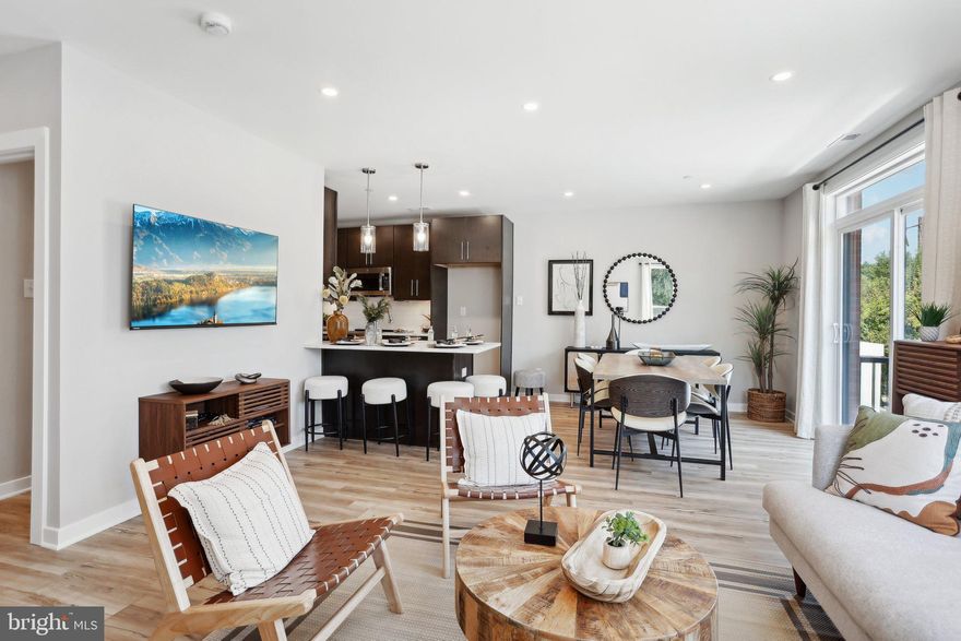 QUICK DELIVERY! This fully loaded Mallard floorplan has a gourmet kitchen, quartz countertops and additional recessed lighting throughout just off the river with beautiful views.  There's also plentiful outdoor space with a roof deck and balcony off the living level.  
Discover River Place, an exquisite townhome community in Conshohocken nestled along the picturesque Schuylkill riverfront. Unveiling the Mallard floor plan, a creatively designed residence that transcends its 1739 square feet with an expansive open-concept layout. Boasting three bedrooms, 2.5 baths, and a tandem 2-car garage with ample storage space, the Mallard is a testament to thoughtful design.
The dining room extends to a deck offering additional entertaining space, complementing the well-appointed kitchen equipped with optional counter seating for sociable gatherings. Upstairs, two bedrooms, a hall bathroom, and a conveniently located laundry room enhance the functionality of the living space. Ascend to the top level to discover a generously proportioned private Owner’s suite with the option of a roof deck. This specific building sits closest to the river!

Immerse yourself in the tranquility of a riverfront setting within walking distance of the Spring Mill train station, Schuylkill River Trail, and vibrant dining and shopping destinations. Community amenities include a charming pocket park, a scenic riverfront trail perfect for both morning jogs and evening strolls, and outdoor observation decks for relaxing moments with neighbors.

Embrace the convenience of low-maintenance living, where the homeowners association takes care of snow removal and lawn care. River Place offers a retreat-like atmosphere, where each day feels like a getaway. Experience the seamless blend of natural beauty and modern convenience that sets this exceptional townhome community apart.  Schedule an appointment today to learn more and tour the models.

Sales center located at 906 Riverplace Drive, Conshohocken, PA. Photos are of the model for illustrative purposes. Actual home and pricing will vary based on buyer selections.