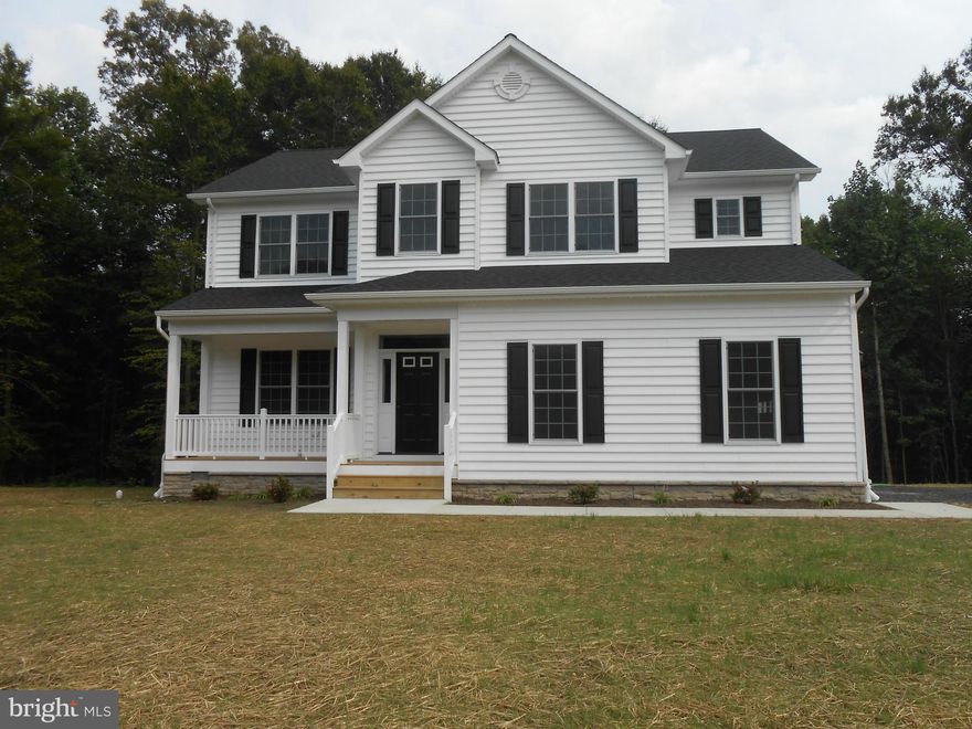 Brand new and ready for new owners!! Beautiful over 2400 sq ft Colonial on 2.48 acre private lot. 4 bedrooms 2.5 baths, hardwood floors on the entire first floor, granite counters, stainless steel appliances,9ft ceilings on both floors,2 car garage finished and porches front and back.  Very nice home. 42 acre out parcel beside home so no more building past the lot.