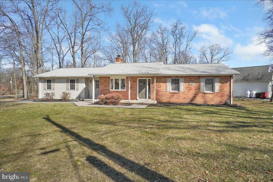 This beautifully well maintained rancher sits on a generously sized corner lot in Lake Heritage. This home offers an open floor plan. The wood burning fireplace can be felt throughout the main level. Right off the kitchen/dining area is a deck for entertaining.  Out back there is a great paver patio with a fire pit for roasting marshmallows on those cool evenings The over sized garage holds two cars and much more. Sellers have painted the whole house and replaced carpets in all 3 bedrooms. The unfinished basement awaits your finishing touches. Deck is being painted.