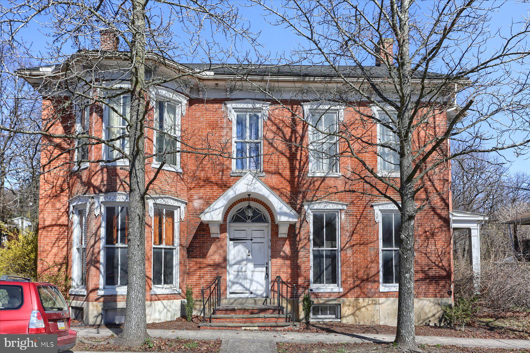 Welcome to this charming almost 4000 square foot 1890 Victorian dream home owned by Senator, Charles Smiley in 1899. This home boasts 5 large bedrooms and 2.5 bathrooms.  This home still holds a lot of the original character and charm; hardwood floors throughout, 10ft ceilings, original woodwork. The first floor has a traditional layout with a foyer, living room, family room, formal dining room, and office. The upstairs had 5 bedrooms and 2 full baths. Truly a remarkable property! Schedule your showing today!