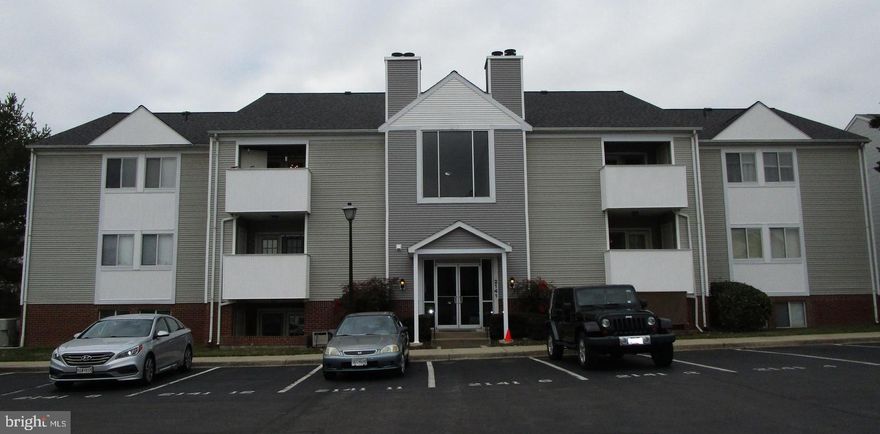 Spacious 2 bedroom 2 bath  ground level Condo in Old Farm Community.  Well maintained. Neutral paint colors and natural and ambient light throughout.  Open kitchen with recessed lighting, island for dining or food prep. Carpeted floors and ceramic flooring in kitchen and bathrooms. Updated bathroom fixtures and lighting. Wood burning fireplace and French doors overlooking covered patio and serene view. Tiled flooring and shelving in laundry/utility room.  Working and gently used washer/dryer provided.  HVAC recently serviced and in excellent condition. Minutes from major highways, boutique shopping and Fort Detrick military base.  Unit is located in the rear of complex, backs to open grassy area and then your view is a sparsely wooded open field. One assigned parking space and sufficient unassigned visitor parking.  Plenty of street parking along main road.  Brick exterior,