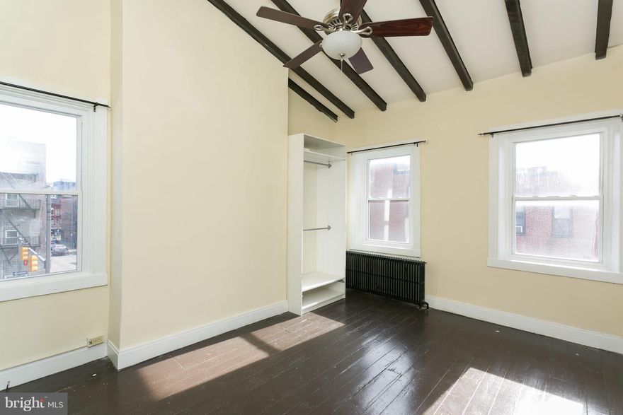 Multi-family/commercial Investment Property - 2-unit with option for 3 in the heart of downtown.- property is zoned for 2 units, ability for 3. Holds B5 zoning dual commercial/residential- BUYER TO VERIFY. Each unit has one large master, full kitch & bath - all totally upgraded.  H/W floors throughout, sep. Laundry area for all units. Parking can be rented next door.