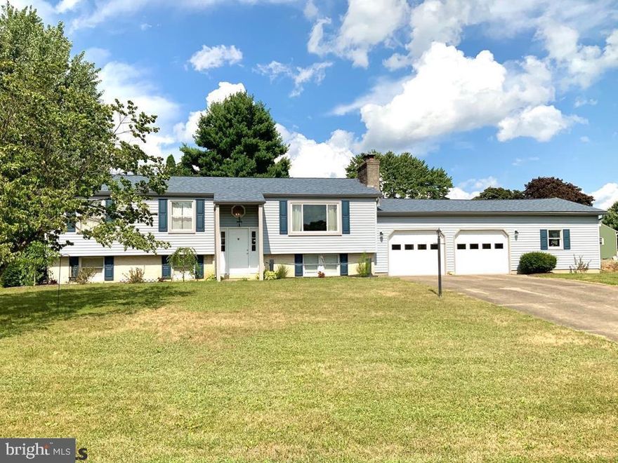 Beautiful bi-level home located in a quiet development just off the main strip in Selinsgrove. This newly renovated property offers three bedrooms, a full bath and half bath in the basement. Fresh paint, new flooring throughout, new roof and updated siding. Enjoy an open floor plan with a spacious living area including a wood burning fireplace and big windows that are capable of brightening your whole day! Eat-in kitchen with plenty of pantry space and side entrance leading to the oversized 2 car garage and work shop. Dining area just off the kitchen with glass doors for easy access to the back deck and patio area. Features a private backyard with tasteful landscaping and curb appeal! Schedule a showing today, this one wont last long!