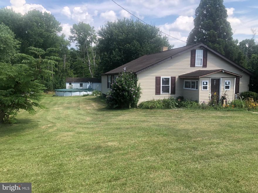 Diamond in the rough!! Great location close to downtown Chesapeake City. Located on over 1/2 acre  with cute gardens and an above ground pool. Some work and you will have an affordable home. Three bedrooms 2 baths, flexible floor plan with room for storage. Two out building and a gently sloping lot.  Unfortunately due to some roof leaks, there is a bit of ceiling damage so needs to be a cash type sale.
New Well installed 3 years ago!