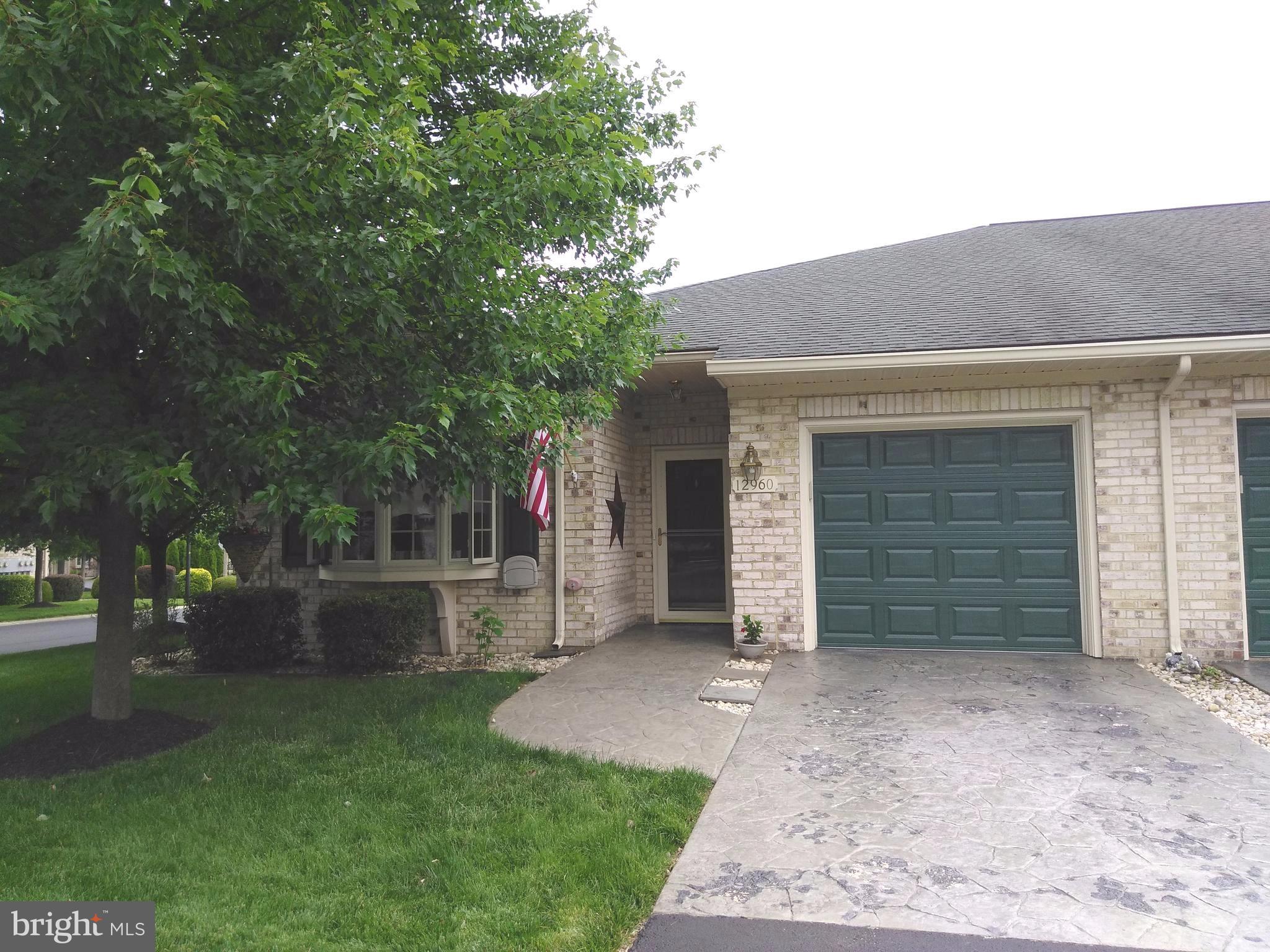 Welcome to one level living! Very well maintained one-story brick townhome (end unit) located in Cortland Manor. 2 Bedrooms, 2 Full Baths and more! 2nd BR (currently used as den) has lovely bay window. Sliding doors lead to private patio off dining room. French doors separate dining room and Master BR. Single car garage. Great North End location ... close to everything!