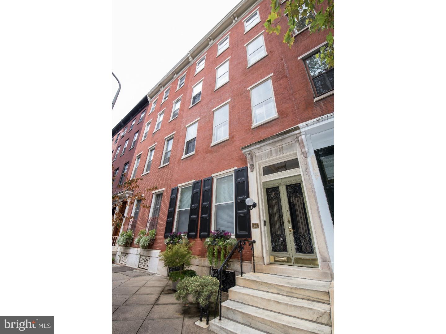 One of a kind impeccably maintained mid-19th Century triplex, with large owner's residence on one of the finest tree-lined blocks in Rittenhouse Square. This is a fantastic opportunity for an owner to live in one residence and generate income from the other apartments, or to transform into a tremendous single family home. The current annual income is $41,700. The owner's home is an incredible tri-level 4 bedroom plus den beginning on the second floor and featuring a deck and large 1-car garage. Enter into a grand hallway with high ceiling, skylight, crown molding, closet area, and a powder room. The beautiful kitchen offers hardwood floors, maple cabinetry, Corian countertops, stainless steel appliances, farm sink, and island counter open to the dining area with a working gas fireplace and built-in window seat. Double French doors lead into the open living room with original wood and brick mantle, picture molding, and 3 south-facing windows. Steps lead to the next level with a spacious den and French doors opening up to a fantastic Ipe wood deck- ideal for morning coffee and evening wine! On the next level are the master bedroom and bathroom along with a spacious south- facing den with built- in book shelves that can also be used as a bedroom. On the top level you'll find two bedrooms, a spacious hallway bath, a storage room, and laundry. The first floor apartment is a junior 1 bedroom featuring an open living/dining area with large windows, 13 ft ceilings, and a kitchen. The sleeping area offers a walk-in closet with built- in shelving and a newly renovated full bath with subway tile. The second floor rear apartment is a gracious bi-level 1 bedroom, 1.5 bath offering an elegant living room with a bay window, detailed plaster moldings, fireplace, glass-enclosed book shelves, and a powder room. The eat-in kitchen features maple cabinetry, subway tile backsplash, stainless steel appliances and a pantry. A wood and steel spiral staircase leads down to the bedroom with a bay window, two walk-in closets, and a full bath. There is a common hallway with coat closet, gilt mirror, decorative plaster molding, and a side door leading to the owner's garage. The basement has a finished area with an office alcove, laundry, a storage room, and a mechanical room. This property features 6 fireplaces, high ceilings, and original hardwood floors throughout.