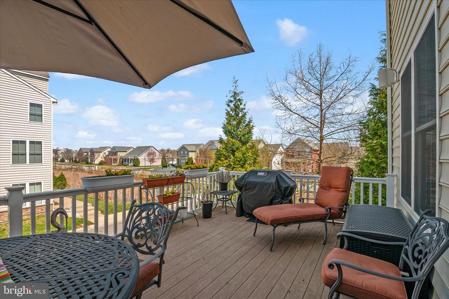 Meticulously maintained by the original owners, this beautifully UPGRADED End-unit Townhome offers 3 finished levels totaling 2300sqft, a 2-car garage, and Rarely found DUAL Primary Suites—each featuring a spa-inspired bath with soaking tub, separate shower, ceramic tile floors & surrounds, and expansive walk-in closets. The versatile entry-level flex space provides an easy option for a private 3rd bedroom (written quote available), office or living room & features hardwood floors & a powder room. Venture up the Oak hardwood staircase to the Open-concept main level, showcasing gleaming hardwood floors in the Great room with corner fireplace that flows seamlessly into the Gourmet kitchen. Highlights include: 42” maple glazed cabinets with soft-close doors and drawers, under and over cabinet lighting, Granite countertops, Stainless steel appliances, Double wall ovens, Gas cooktop, 12x12 Ceramic Tile floors, Lighted pantry, Upgraded Trim package, plus a two-tier island with seating and a separate dining area. Step outside to the 12x20 Trex deck complete w/ propane line for your Grill & outdoor speakers making it perfect for entertaining on these upcoming Summer nights! The upper level features dual primary suites, including a front bedroom with vaulted ceiling and exceptional space throughout & Full size Laundry room w/ Front loading washer/dryer. Additional features include: Brand NEW Roof, central vacuum, whole-house audio throughout main living areas, bedrooms & deck, whole-house humidifier, ceiling fans, brushed nickel fixtures, utility sink rough-ins (laundry and garage), custom garage shelving, and kayak storage under the deck. Thoughtfully landscaped perennial gardens provide color year after year and is just another example of the love that was poured into designing this home! Enjoy an amenity-rich community with pool, clubhouse, and floating dock/pier with access to Thompson Creek. Ideally located just minutes to the Chesapeake Bay Bridge for an easy commute and convenient access on and off the Shore. Don’t forget to Check out the 3D iGuide Tour!