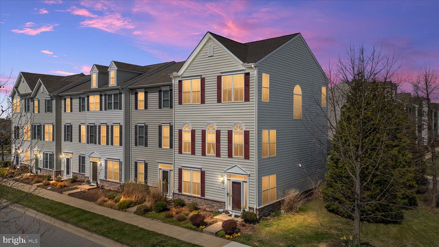 Meticulously maintained by the original owners, this beautifully UPGRADED End-unit Townhome offers 3 finished levels totaling 2300sqft, a 2-car garage, and Rarely found DUAL Primary Suites—each featuring a spa-inspired bath with soaking tub, separate shower, ceramic tile floors & surrounds, and expansive walk-in closets. The entry level features hardwood floors, a spacious living room, private office/flex space, and powder room. Venture up the Oak hardwood staircase to the Open-concept main level, showcasing gleaming hardwood floors in the Great room with corner fireplace that flows seamlessly into the Gourmet kitchen. Highlights include: 42” maple glazed cabinets with soft-close doors and drawers, under and over cabinet lighting, Granite countertops, Stainless steel appliances, Double wall ovens, Gas cooktop, 12x12 Ceramic Tile floors, Lighted pantry, Upgraded Trim package, plus a two-tier island with seating and a separate dining area. Step outside to the 12x20 Trex deck complete w/ propane line for your Grill & outdoor speakers making it perfect for entertaining on these upcoming Summer nights! The upper level features dual primary suites, including a front bedroom with vaulted ceiling and exceptional space throughout & Full size Laundry room w/ Front loading washer/dryer. Additional features include: Brand NEW Roof, central vacuum, whole-house audio throughout main living areas, bedrooms & deck, whole-house humidifier, ceiling fans, brushed nickel fixtures, utility sink rough-ins (laundry and garage), custom garage shelving, and kayak storage under the deck. Thoughtfully landscaped perennial gardens provide color year after year and is just another example of the love that was poured into designing this home! Enjoy an amenity-rich community with pool, clubhouse, and floating dock/pier with access to Thompson Creek. Ideally located just minutes to the Chesapeake Bay Bridge for an easy commute and convenient access on and off the Shore. Be sure to check out the 3D iGuide Tour!