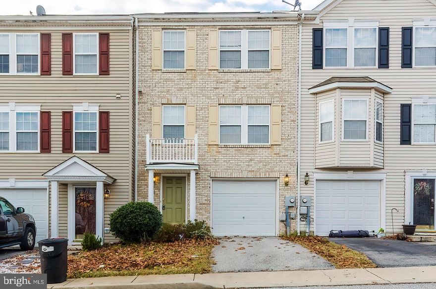 Move right in and enjoy this townhouse before the year ends!....Bump out off kitchen with gas Fireplace...hardwood kitchen with island.  Three Bedrooms, Three and one half baths, Lower level has room to grow. Great commuter location.