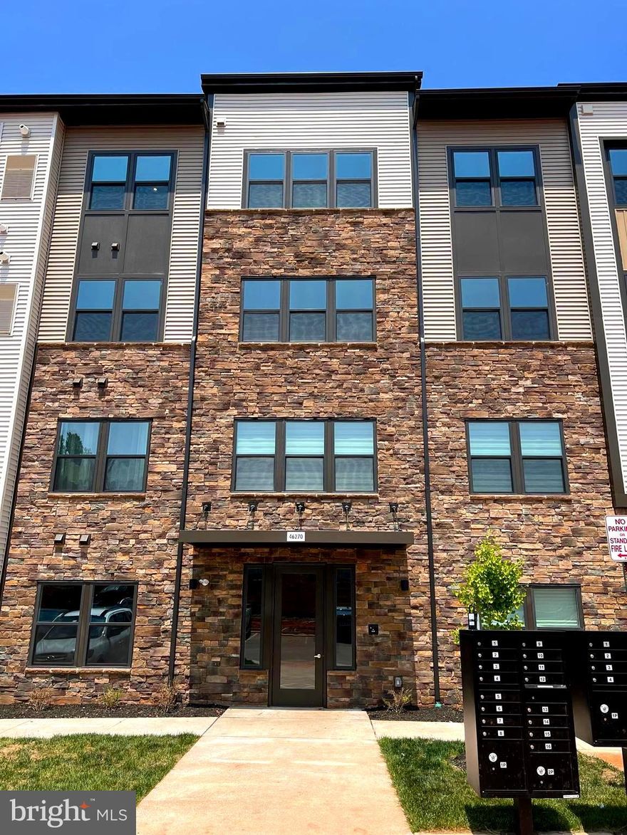 Credit Score needs to be 700+.  Welcome home to this fabulous BRAND NEW elevator condo!   You will love the stainless steel kitchen appliances, giant island to entertain on, upgraded bathroom fixtures, tiled oversized shower and dual vanities in the master bath and tile in the second bath.  The open floor plan has LVP flooring in the main living area which opens up to the balcony with spectacular views of the mountains to the north and west. Located within an easy drive of Reston Town Center, the Dulles Corridor, Dulles Airport, Dulles Town Center as well as the Wiehle Metro Station, getting where you need to go is easy! As for shopping, things are at your fingertips as this fantastic condo is adjacent to Costco and Harris Teeter and all the wonderful shops, salons and eateries of Cascades Overlook and Potomac Run Plaza are just below the community as well as all the shops at Cascades.  You can get your fitness on when enjoying the pickle ball & basketball  courts or just relaxing at the pool. The assigned parking space in the underground garage is just 3 spaces from the door to the elevator.  The building has security monitoring 24x7 and an app will be provided.  Life is good at 46720 Mount Allen Terrace #402! 

Being as the address does not exist yet in the Loudoun County Systems, please verify school information.  Schools listed are for a nearby property.