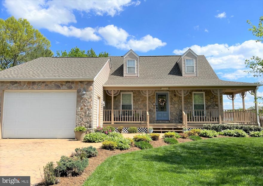 WOW!! It will be apparent to you that this home has been meticulously cared for.  There is nothing left for a buyer to do but move in and enjoy a vacation setting in your own backyard. In front there is a beautiful stamped concrete driveway and walkway that lead you to a welcoming front porch. Upon entry to the house, the main level has gleaming wood floors. The kitchen has been recently updated and includes stainless steel appliances.  All bathrooms have been updated. Out back you will find an enclosed patio sunroom that looks out to the inground HEATED pool! There is even a natural gas line out back for your grill. The garage was added in 2004. It is oversized in length, width and height. The car lift DOES convey. There are pull down attic stairs in the garage prefect for storage. Recent updates include a new roof in 2021, new HVAC in 2021, new water heater in 2021. This property keeps giving and giving.  Schedule your viewing quick before its gone!!