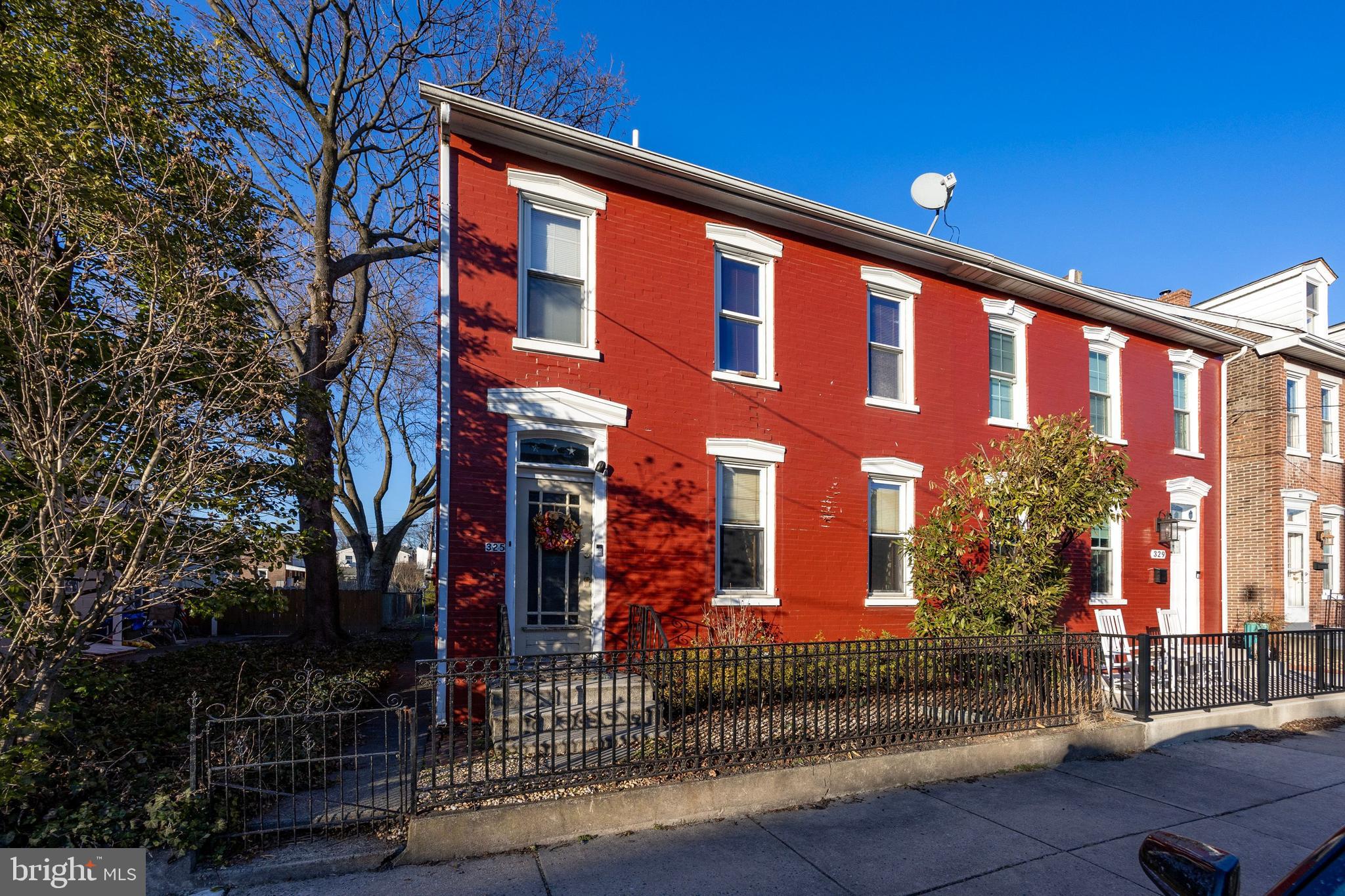 Multiple offers! Offer deadline end of day Wednesday 3/27 for decision Thursday 3/28. Spacious 4 (possible 5) bedroom South Pottstown twin. This classic brick colonial is within walking distance to everything! Enter into the foyer and you will find the front stairwell. Admire the original woodwork as you transition into the living room. Your eyes are drawn to the decorative mantel and high ceilings. A bonus room is just off of the living room. As we continue to the back of the home, we find a formal dining room with turned second staircase and more beautiful original woodwork. A bright and sunny galley kitchen sits beyond the dining room. On the other side of the kitchen is a rear mudroom as well as TWO bonus rooms! Could be your 4th and 5th bedrooms if you need. One room offers access to the fenced back yard, shed and off-street parking. Ascending one of the two staircases to the second floor we find three bedrooms and TWO full baths! The unfinished walk up attic provides ample storage or could be finished for even more living space. With efficient gas heat, replacement windows and lots of room to grow, this home is ready for you to make it your own. Borough U&O inspection is already complete and passed with flying colors! Immediate occupancy available. Please excuse the boxes, seller is packing/moving.