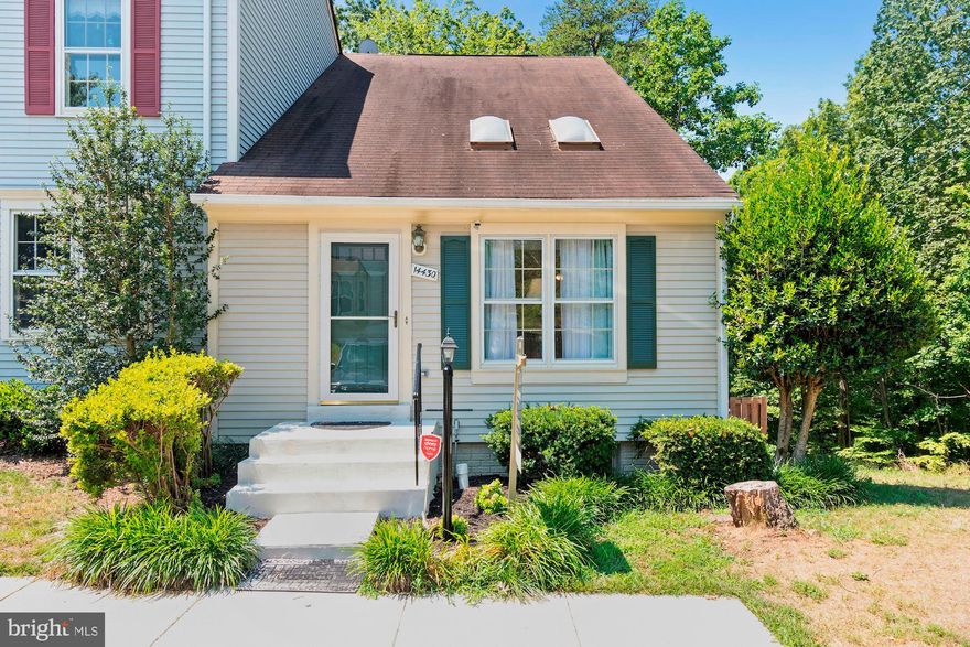 Move in ready Montclair 3 level end unit townhouse! On the end of a cul de sac and backs to trees. 2 owners suites-one is on the main floor.  Bonus room in basement. Fully fenced backyard and spacious deck. Kitchen just renovated with granite counters and all new stainless steel appliances. New granite sink tops in bathrooms. New carpet! HVAC is 5 years old. Includes 2 assigned parking spaces. Montclair was ranked #35 out of 100 in money magazine for "best places to live"! Montclair amenities include lake privileges, beaches, picnic areas, golf course membership available, country club membership available, swimming pool membership available, tennis membership available, tot lots, sidewalks, planned events throughout the year! There is also a shopping area, restaurants, library, daycare, convenience store and more! There are commuter bus stops throughout Montclair w/ commuter lots and options nearby!