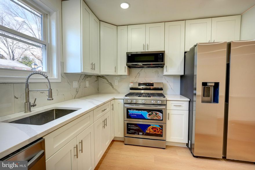 GREAT LOCATION *** Welcome to this totally renovated townhome. This 3bed/2 full baths home comes with high-end everything! All new designer kitchen with custom cabinets and gorgeous quartz countertops and backsplash. All new high-end Stainless Steel appliances. Center Island with breakfast bar. All new energy efficient windows throughout. All new modern interior and exterior doors. Beautiful Luxury Vinyl Floors throughout. Designer new bathrooms with modern fixtures and tiles. Special LED Lightings everywhere. Brand new HVAC System and new Hot Water Heater. Easy access to public transportation, minutes to ICC-200, Glenmont Metro Station. Walking distance to shopping, restaurants, etc.