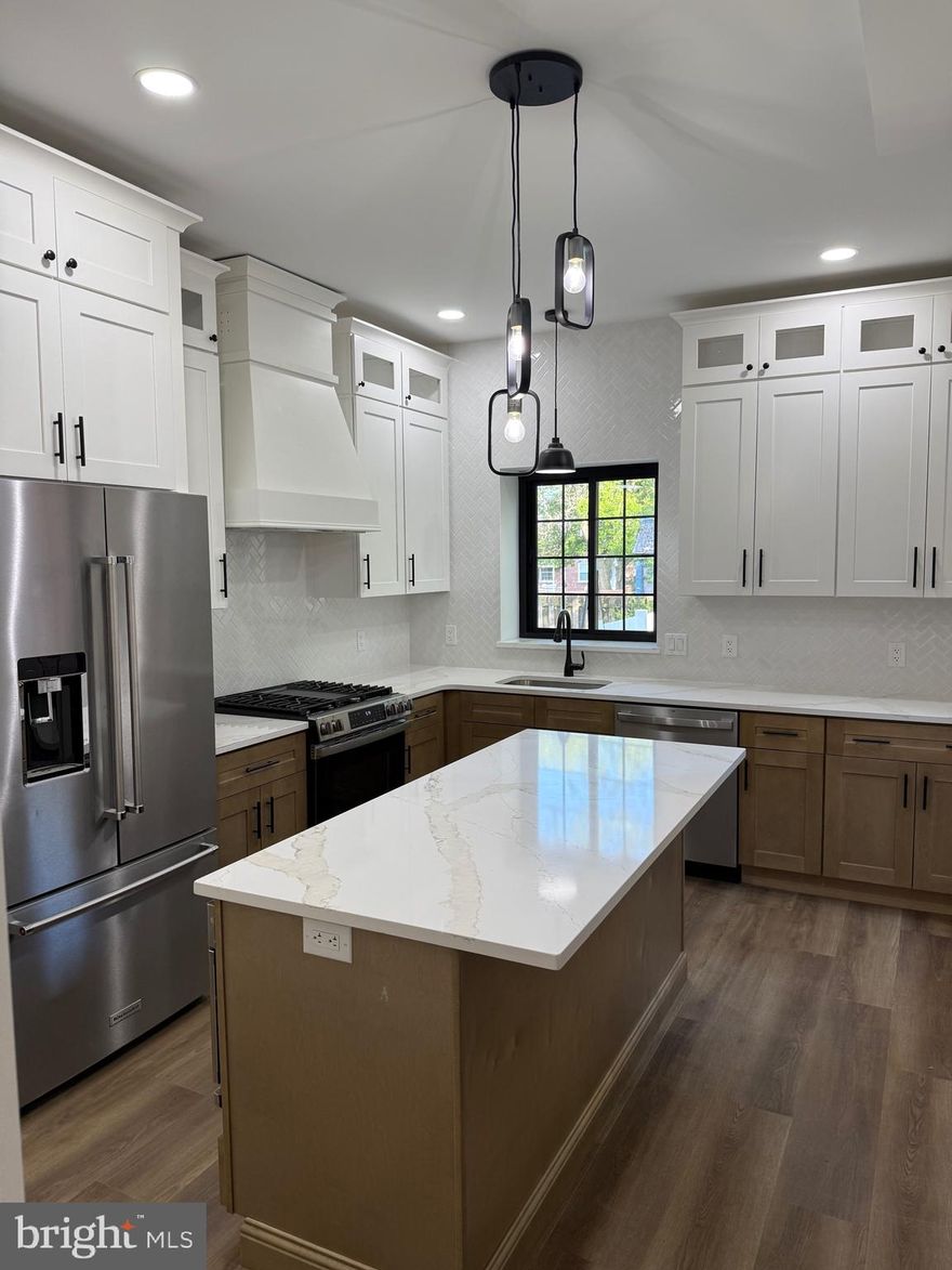 Welcome to Your Dream Home at 530 Park Avenue!

Don't just walk—RUN—to this stunning 4-bedroom, 2.5-bath masterpiece that has been meticulously customized by the outstanding team at 2 By Design builder & remodeling. This house is not just a place to live; it’s a lifestyle waiting to be embraced.

As you step through the front door, you’re greeted by a warm and inviting living room/dining area, perfect for hosting gatherings or intimate family dinners. The space is flooded with natural light, creating an atmosphere that is both cozy and vibrant. And with the addition of a brand-new half bath, your guests will feel right at home.

Prepare to be wowed by the heart of the home: the breathtaking 15 x 11 custom kitchen! This gourmet oasis features towering 54-inch wall cabinets that provide ample storage for all your culinary needs. The spacious 6 x 3 center island is perfect for meal prep or casual breakfasts, adorned with luxurious new quartz countertops that add an elegant touch. Stunning ceramic-tiled walls surround a farmhouse sink, while a 4-burner gas cooking range with a middle grill, built-in microwave, and a delightful custom coffee bar make this kitchen a chef's paradise.

Moving to the second floor, you’ll find the expansive primary bedroom that exudes tranquility. This private retreat features its own customized en-suite bathroom, designed to elevate your morning routine. Indulge in the large ceramic-tiled walk-in shower with built-ins, his-and-hers double vanities, and a convenient linen closet, all set on chic tiled bathroom floors. Just steps away, you’ll appreciate the thoughtfully relocated upstairs laundry room, adding convenience to your daily life.

This floor also boasts the second beautifully customized bathroom, showcasing a ceramic-tiled tub/shower combination, complete with a fresh new vanity, countertop, and modern hardware. Down the hall, the second bedroom invites rest and relaxation, while the third floor surprises you with spacious third and fourth bedrooms, perfect for family, guests, or even a home office. Each bedroom is equipped with new ceiling fans and cozy carpeting, ensuring comfort and style throughout.

Step outside to discover your very own outdoor haven. The delightful 17 x 9 covered front porch is the ideal spot to sip your morning coffee while watching the world go by. The backyard, featuring a new vinyl fence, offers a safe space for the kids and pets to frolic, and is perfect for entertaining friends under the stars.

Located just a minute away from an array of bars, restaurants, shops, and public transportation, this home perfectly balances tranquility and convenience. With plenty of parking available at all times, you can entertain guests without a worry.

530 Park Avenue is not just a house; it’s a sanctuary where every detail has been thoughtfully designed for modern living. Don’t miss out on this incredible opportunity—schedule your viewing today, and start the next chapter of your life in this magnificent home!