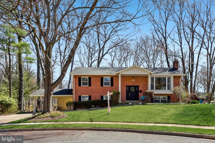 Welcome to this stately brick residence located in a quiet, picturesque cul-de-sac. This amazing home is in the highly sought after Winterset community, just a short drive from great shopping, restaurants and with a quick access to metro transportation, I-495, Tysons Corner and the Mosaic District. Families are assigned to the prestigious Mantua-Frost-Woodson schools and have access to plenty of public parkland with miles of scenic trails running along a gentle, burbling creek. This well maintained residence offers 5 great size bedrooms and 3 full baths across 2700 square feet. The main level features open but distinct spaces, including a large living room, a spacious dining area and a chef’s kitchen with huge island and bar seating.  This gourmet kitchen features updated modern cabinetry with ample storage space.  The sunlight pouring through the new dining room doors draws your attention to the huge private deck where you can kick back and relax or enjoy a BBQ. Don’t forget to visit the tranquil gazebo where you can enjoy sipping a cool drink after a long day. Take a minute here and enjoy overlooking the beautiful expansive private garden. The grounds include a fully electrified work shed - an ideal space for woodwork or potential children’s playhouse! As you walk back inside on the top floor, you’ll find a spacious primary bedroom with dual closets and a newly renovated ensuite bath. Down the hall there are two additional large and airy bedrooms complemented by another full bathroom with a tub. In the lower level, you will find a large family room with an inviting cast iron wood burning fireplace. This welcoming space could easily serve as a playroom, a media room, a home gym or whatever your heart desires. You will be pleasantly surprised to find two additional large bedrooms (one of which has a walk in closet) and another full bathroom on this level. Complete your tour with the huge mud room/storage room and finally walk out to the two vehicle carport equipped with a newly installed EV outlet and an attached storage shed for all your gardening tools.  Welcome home!

KEY UPDATES — 2019: New HVAC System, New Windows; 2021: New Gutters; 2023: Kitchen cabinets and backsplash upgrades, New kitchen door, New dining room sliding doors; New washer and dryer; 2024: Electrical panel upgrade, Electrical vehicle outlet; 2025: New front door, New entrance way staircase posts and balustrade, Fresh paint in kitchen and dining room, New lighting upgrades.