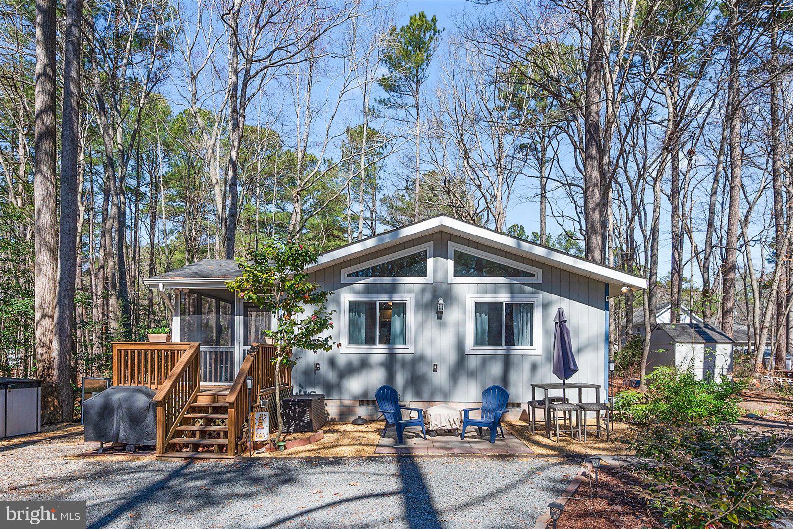 This charming 3-bedroom, 2-bathroom home in Ocean Pines, MD has been renovated within the last 7-8 years. This home boasts a newer roof, HVAC system, LVP flooring throughout and a modern kitchen with contemporary finishes such as quartz counter tops and stainless steel appliances. The mobile island with granite makes this kitchen perfect for all of the culinary space you need. The open floor plan with cathedral ceilings creates a spacious and inviting atmosphere, perfect for family living or entertaining guests. An additional flexible room provides endless possibilities—use it as a sunroom, home gym, extra bedroom, or playroom to suit your needs. Enjoy the outdoors from the comfort of the screened-in porch, a peaceful retreat for relaxation. This home is located on a cul-de-sac and is ready for you to enjoy. This home is exactly what you've been looking for in Ocean Pines. Don't miss the opportunity to make it your own!